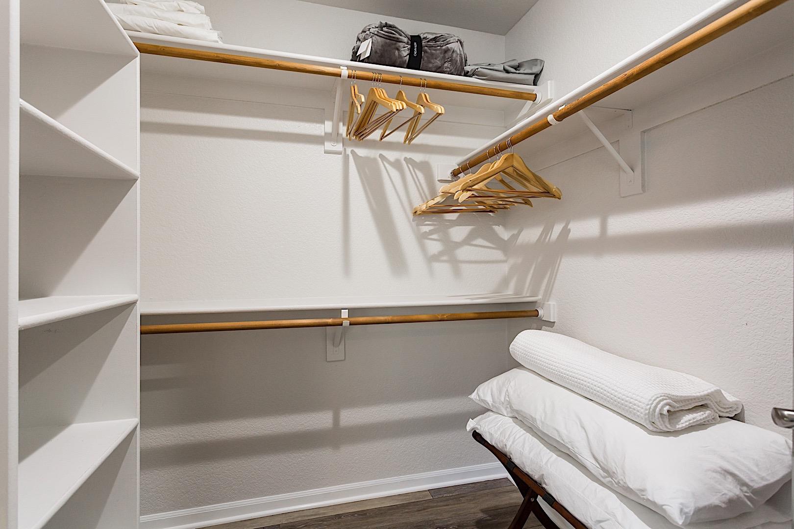 Large Walk in closet with some extra comfortable blankets and pillows available