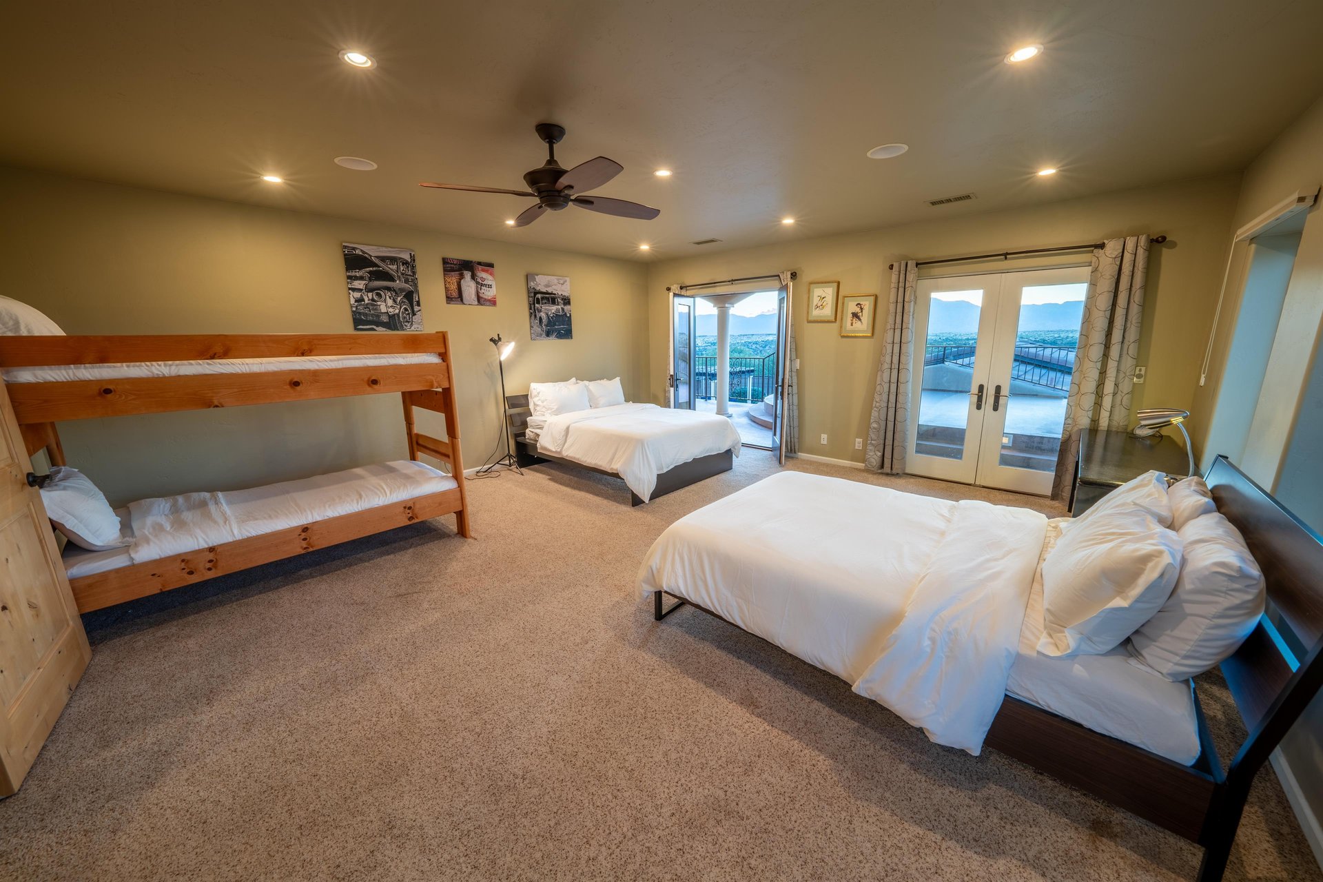 Upstairs Guest Room With Twin Bunk Bed and 2 Full Beds