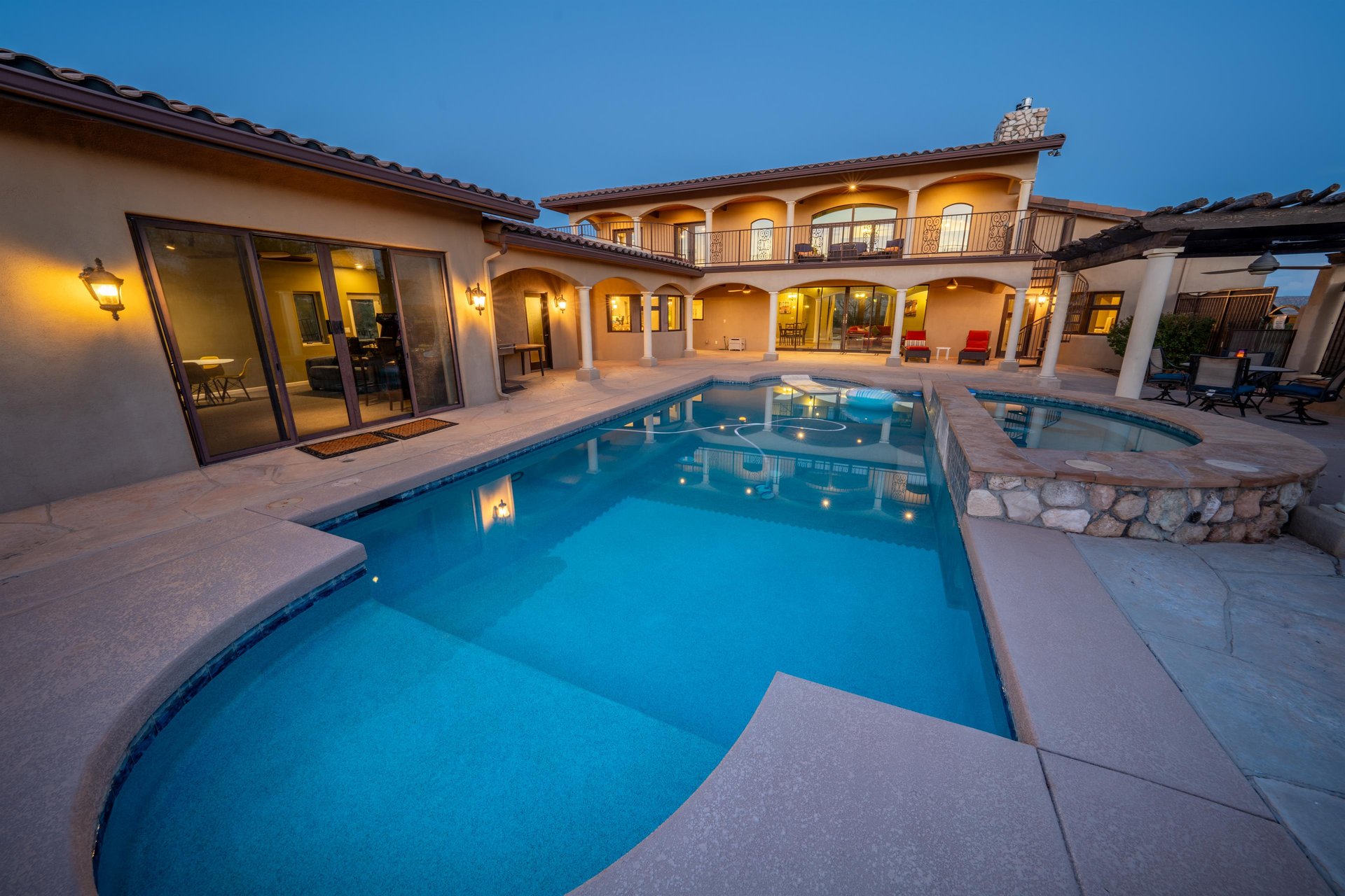 Beautiful View Of Pool At Dusk