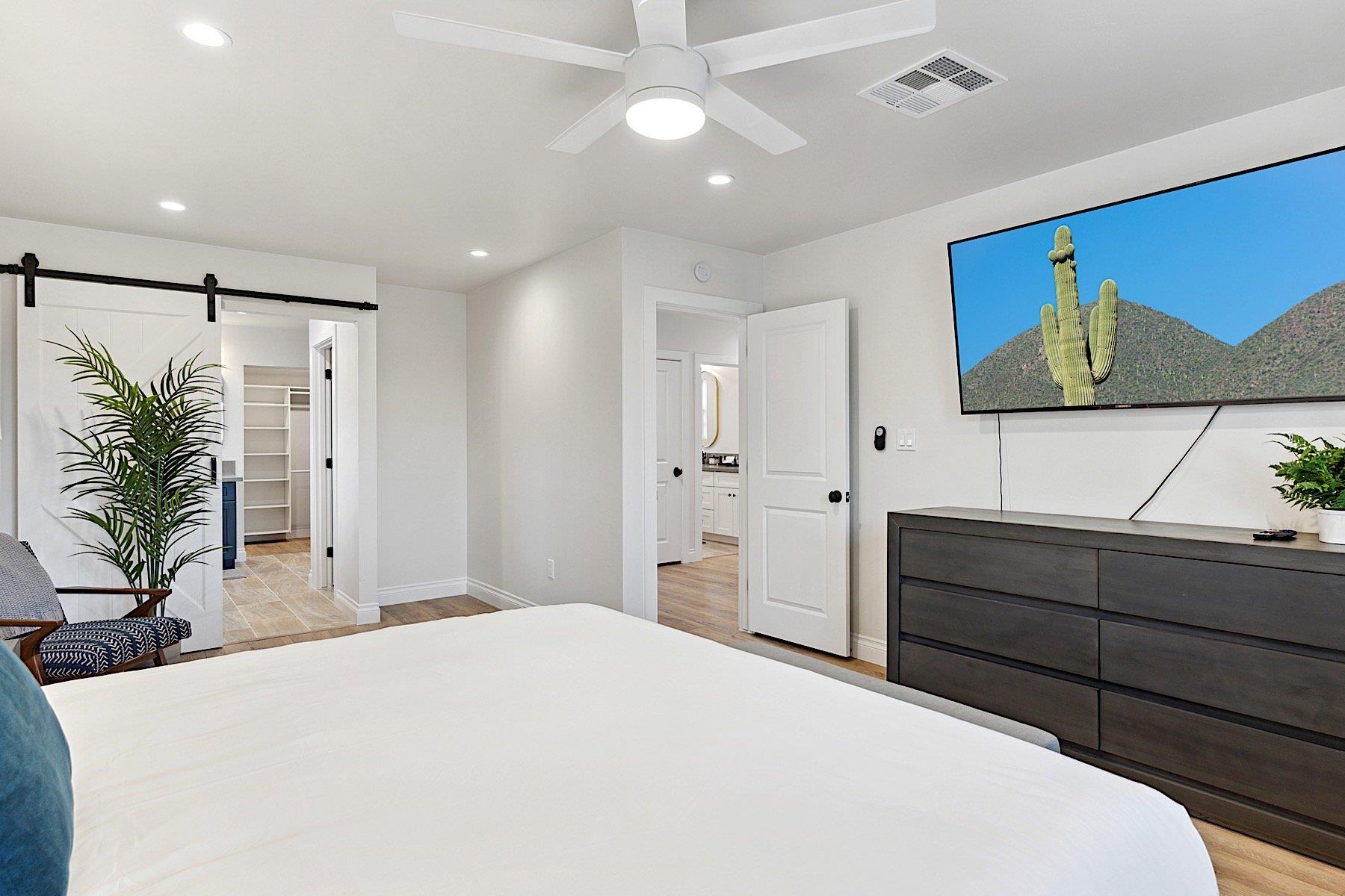 Master suite w mounted 65 Smart TV