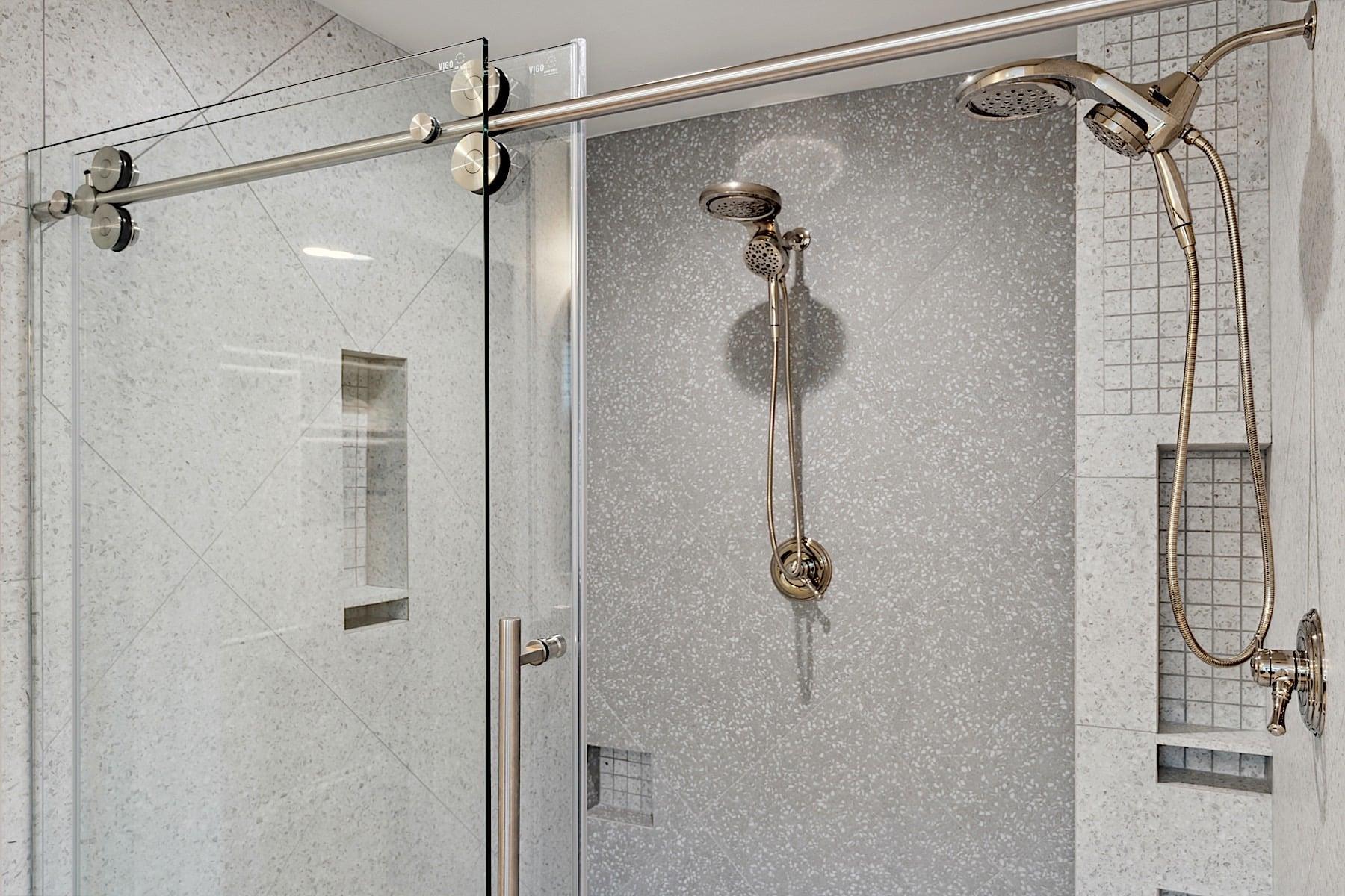 Large walkin shower with dual shower heads larger in person than in the photos