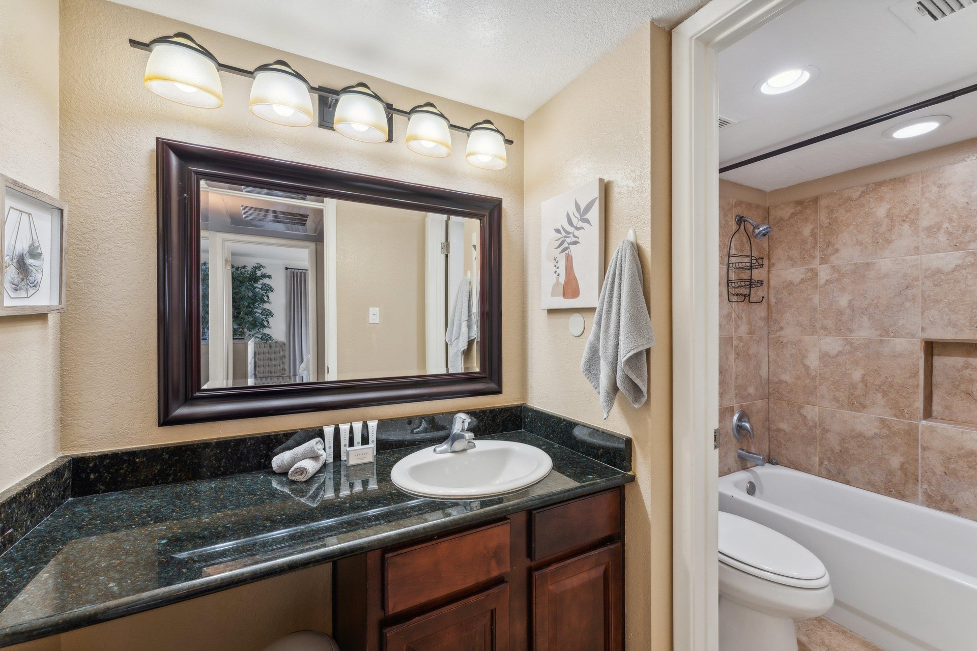 Bathroom, separate commode room with sower tub combo.