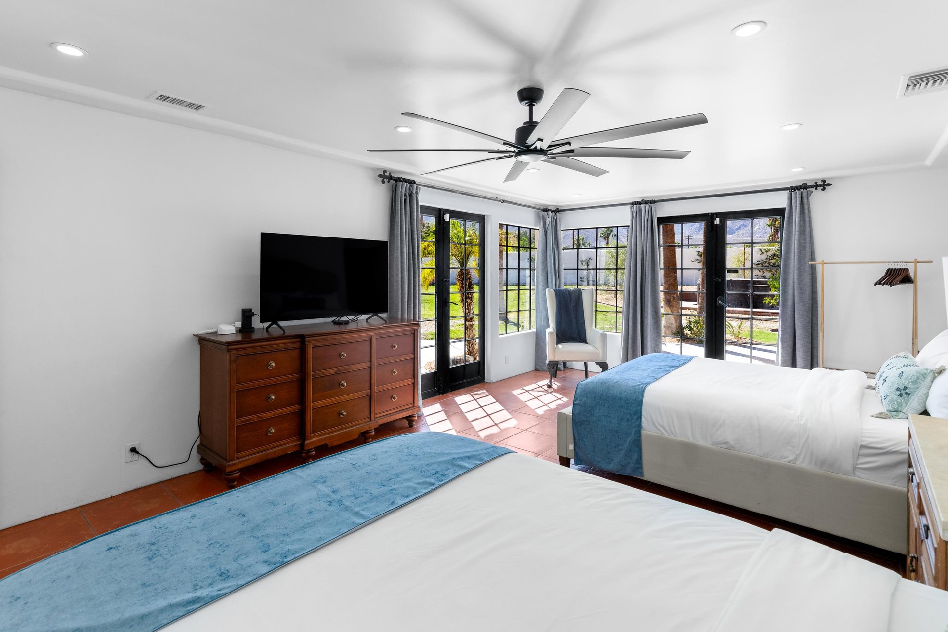 Primary bedroom with two queen beds