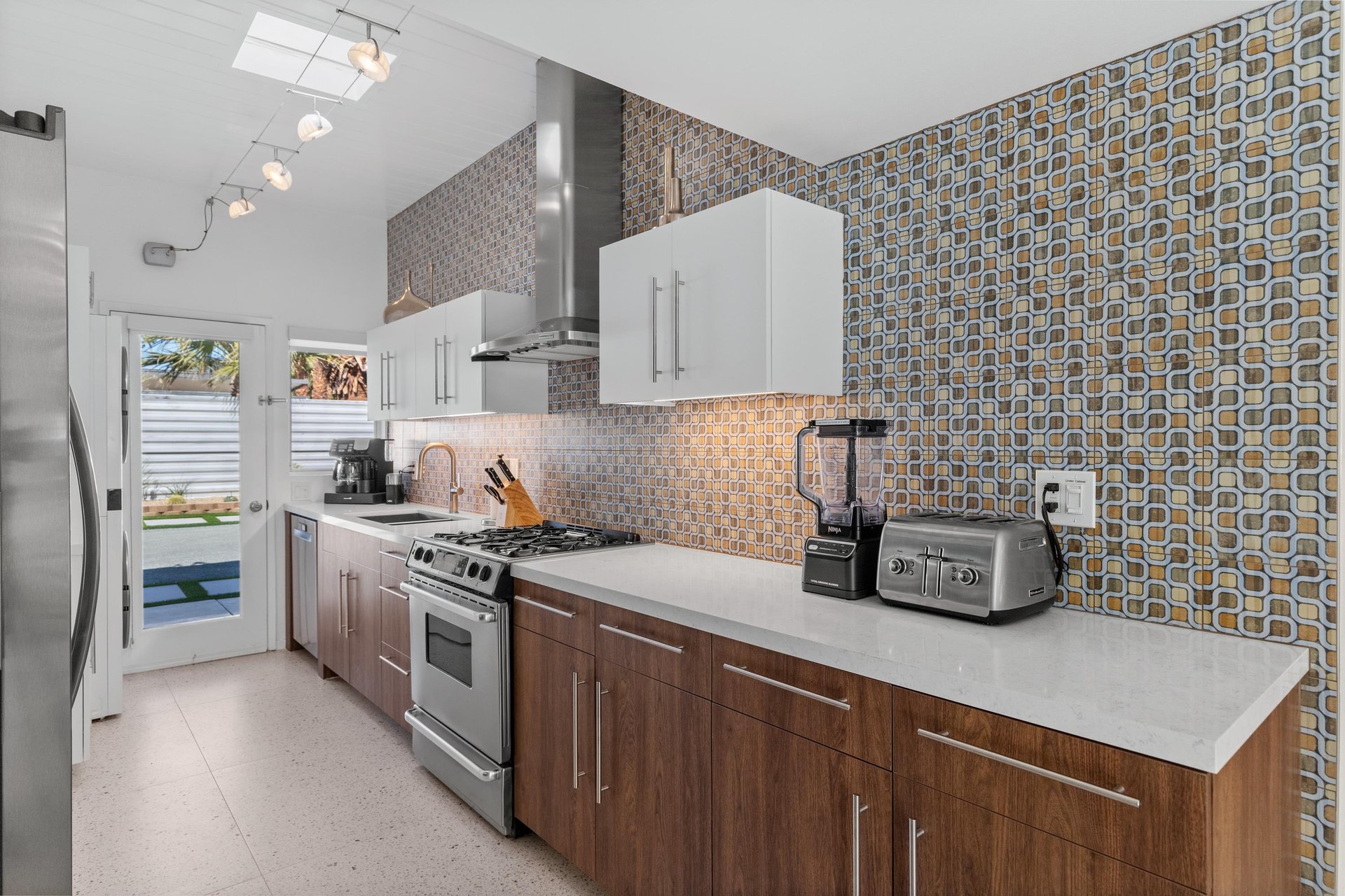 Long galley kitchen with all of the bells and whistles