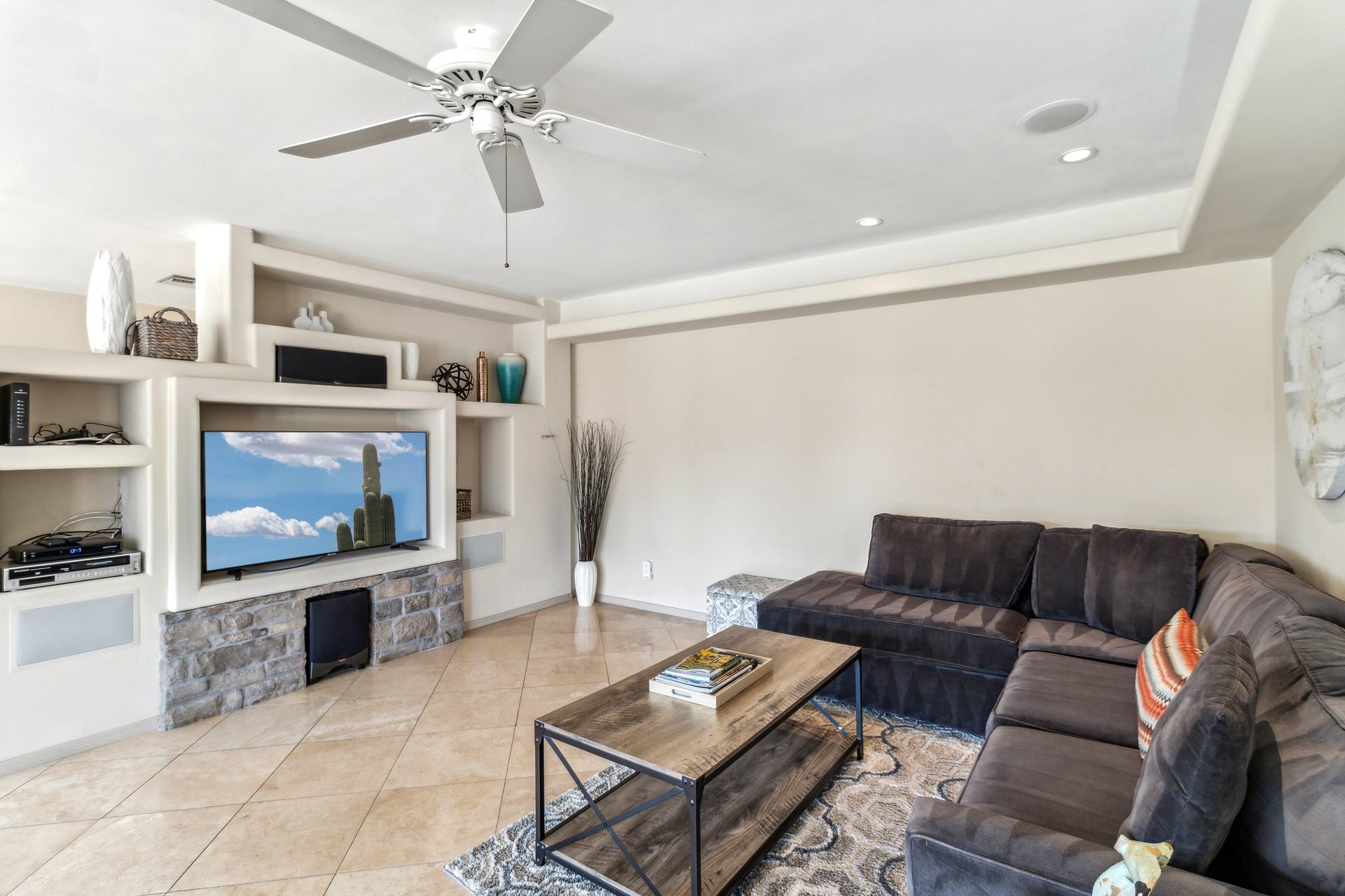 Enjoy the living room with a great couch that you can sink into. Large Flatscreen TV