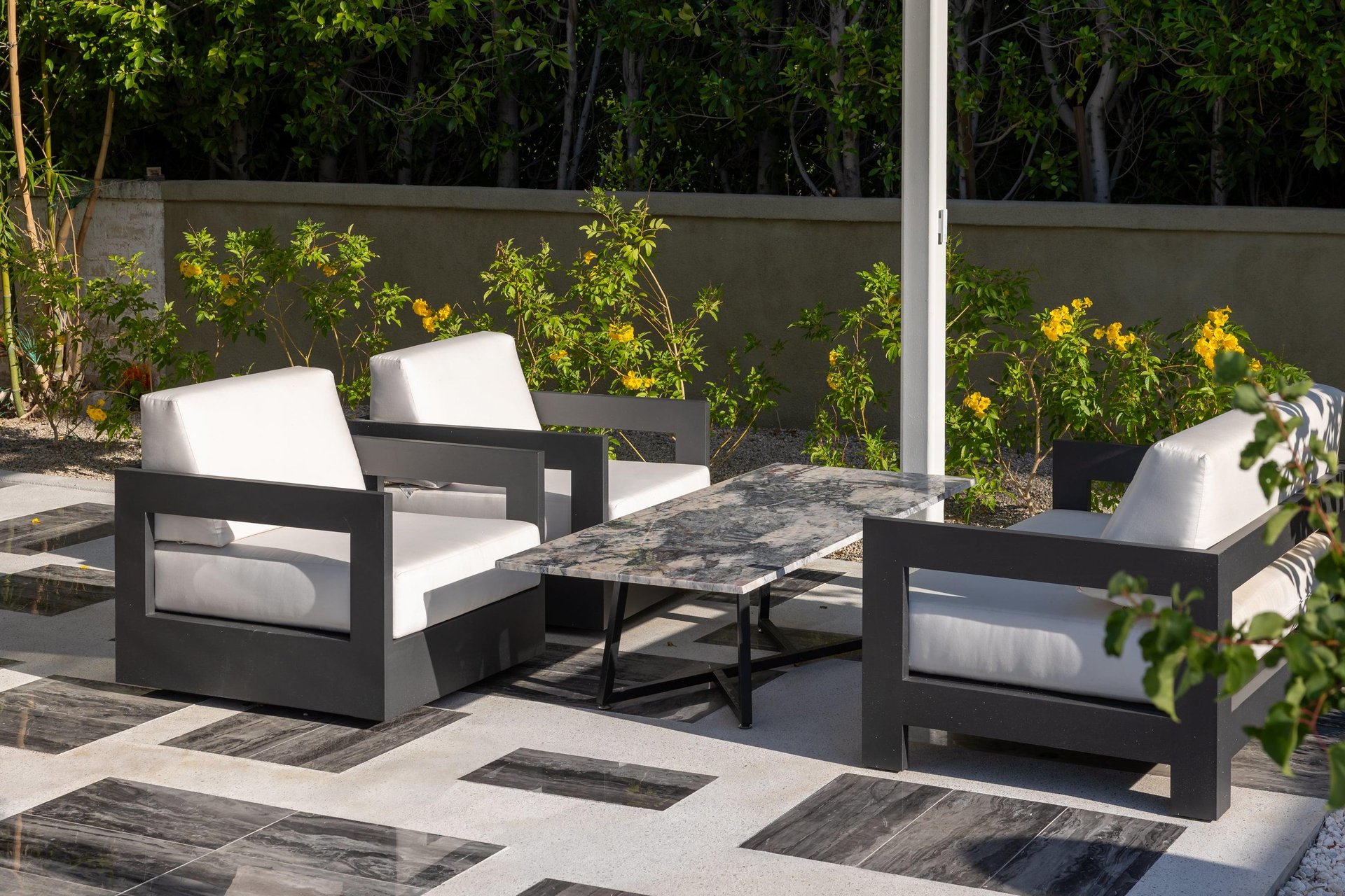 Additional seating area next to outdoor dining space.