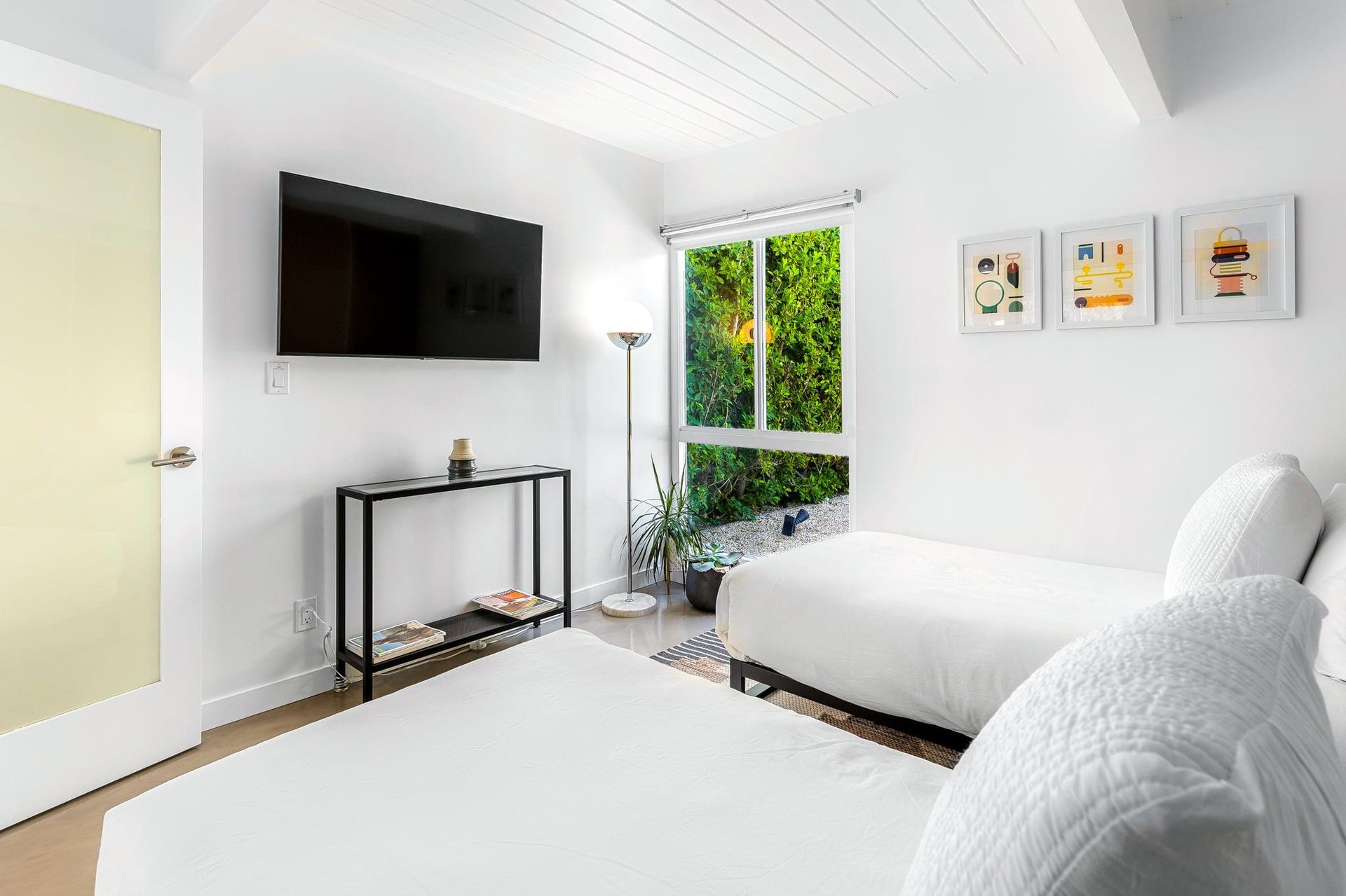 Guest bedroom with access to the yard