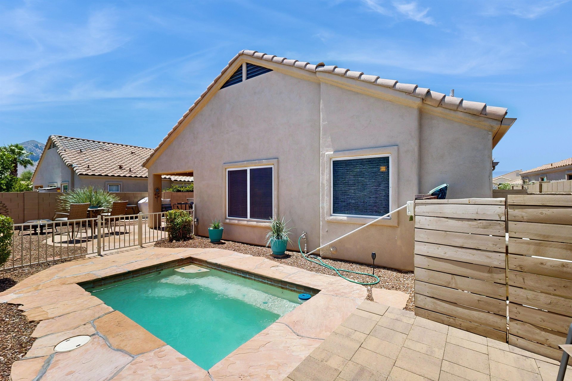 Views of the spool poolspa located off the back patio.