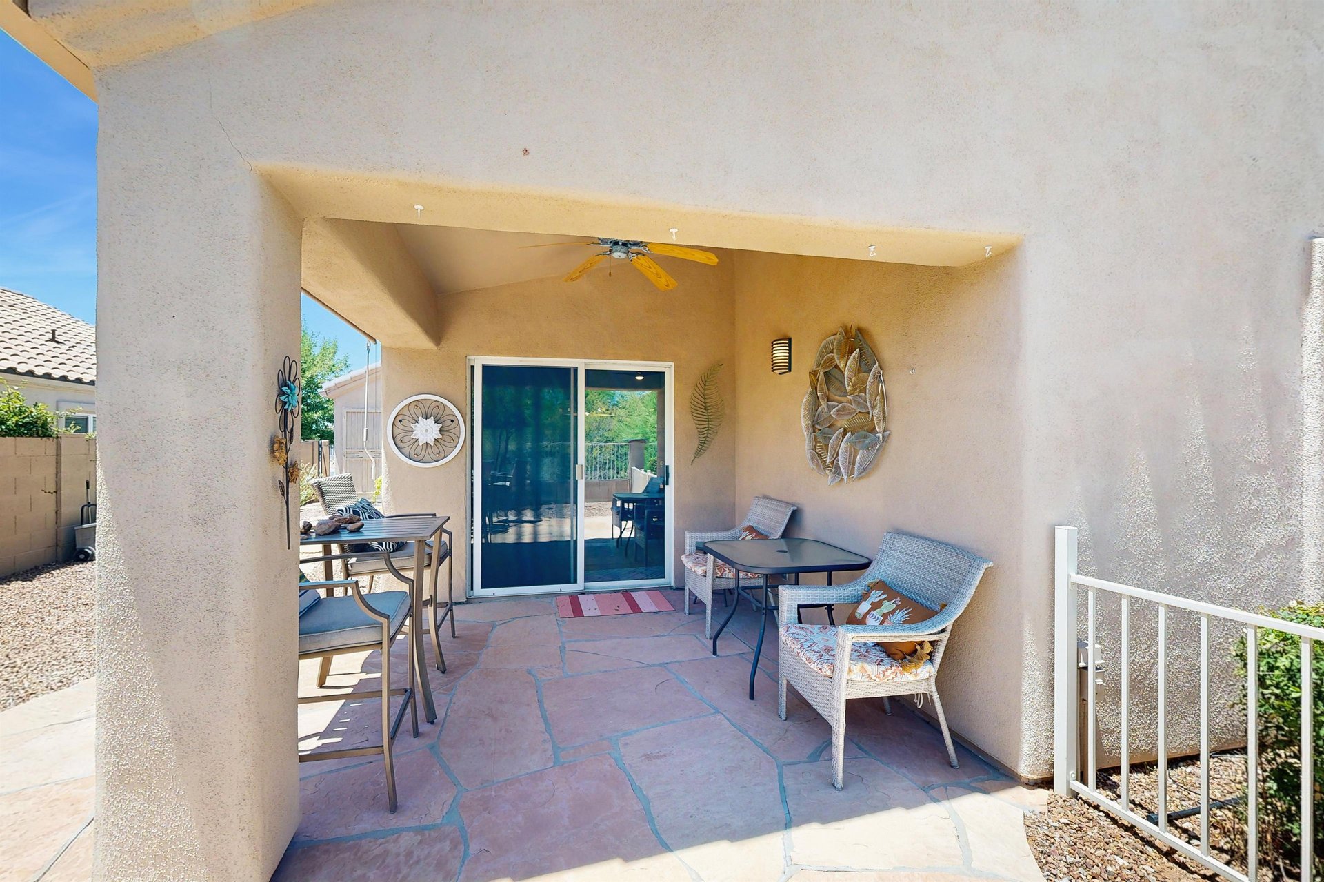 Equipped with outdoor seating, an outdoor fan, covered area for shade, BBQ, firepit, and spool access.