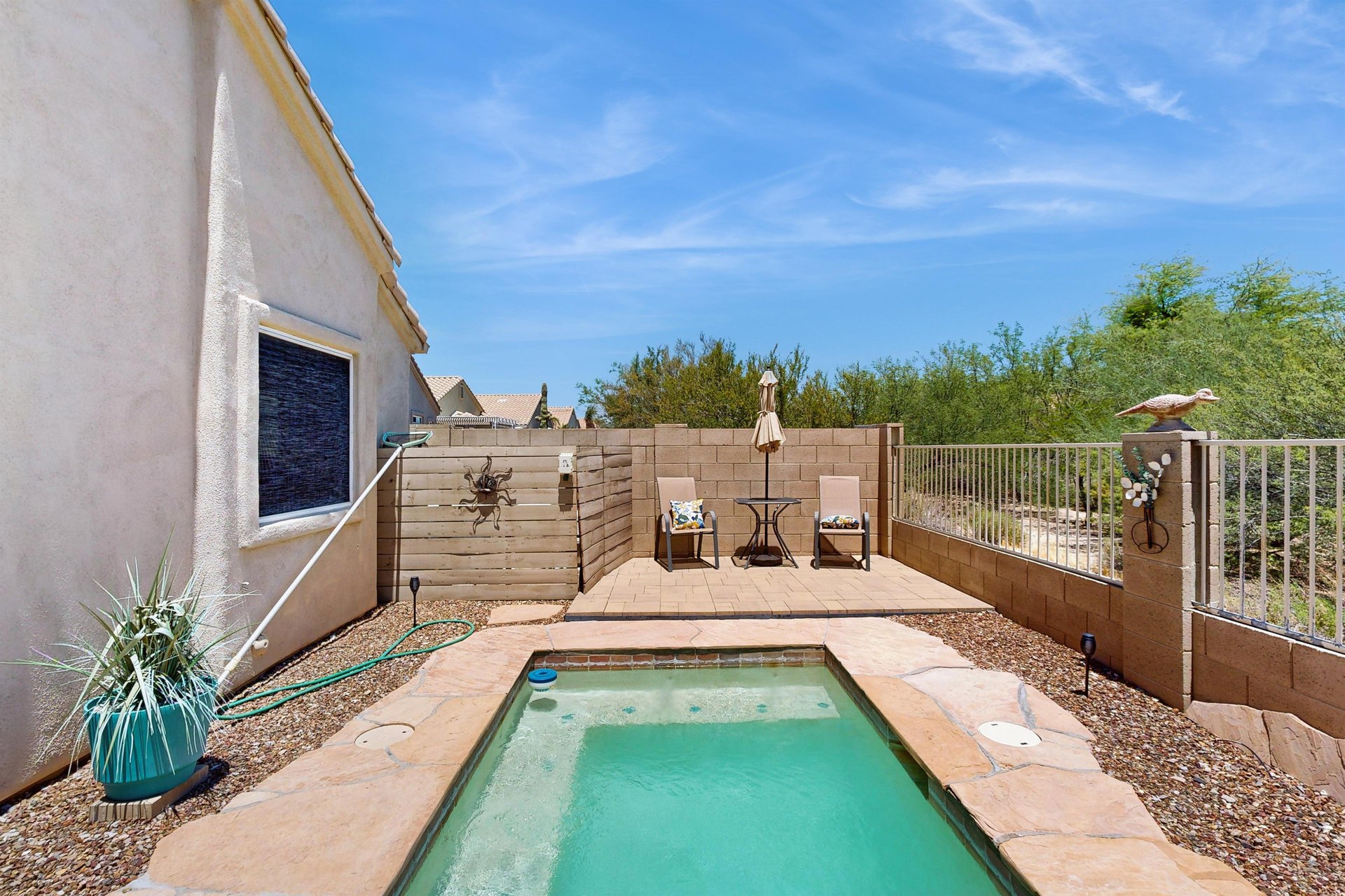 Gated and private spool spapool can be found just off of the back patio.