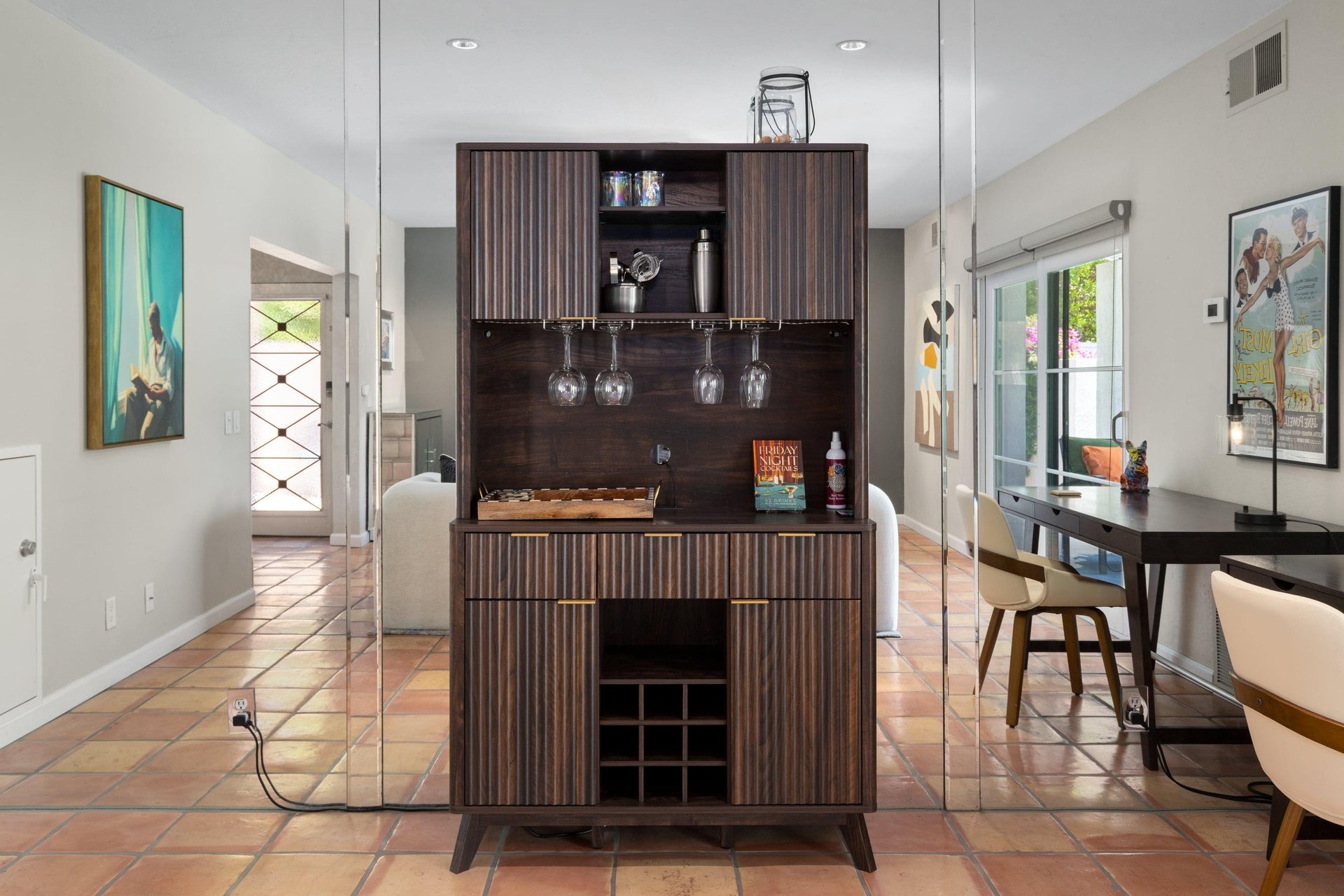 Bar area with wine glasses.