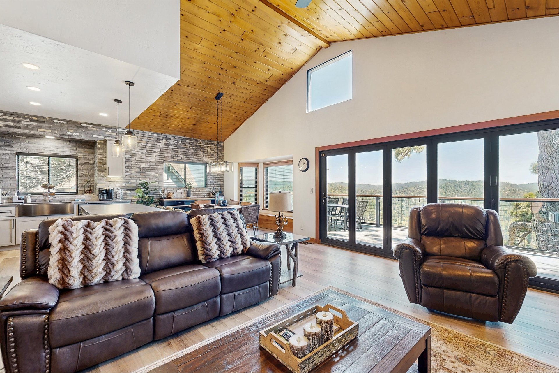 Equipped with a smart TV, fireplace, and openconcept living space.