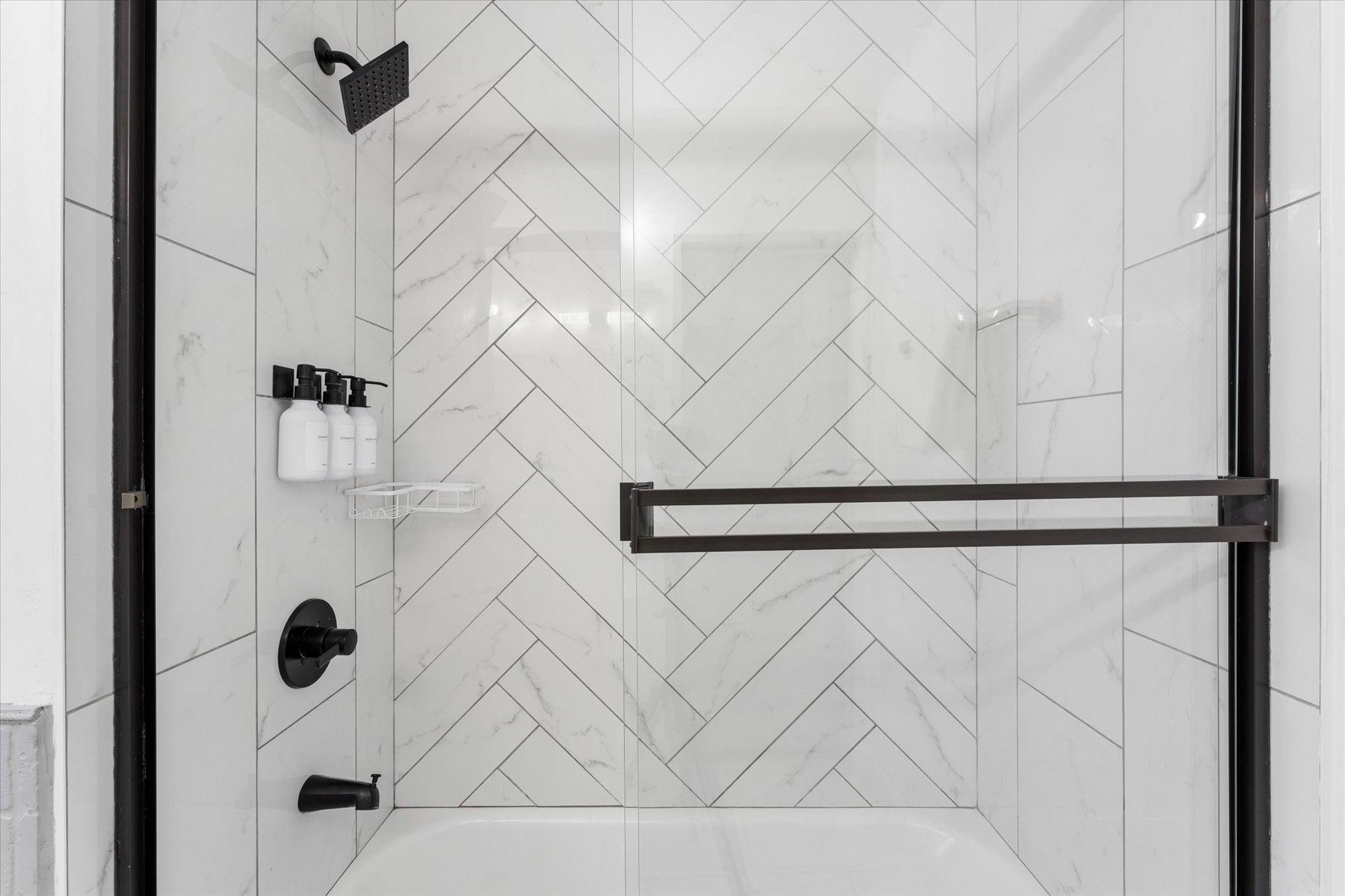Ensuite bathroom with showertub combination.