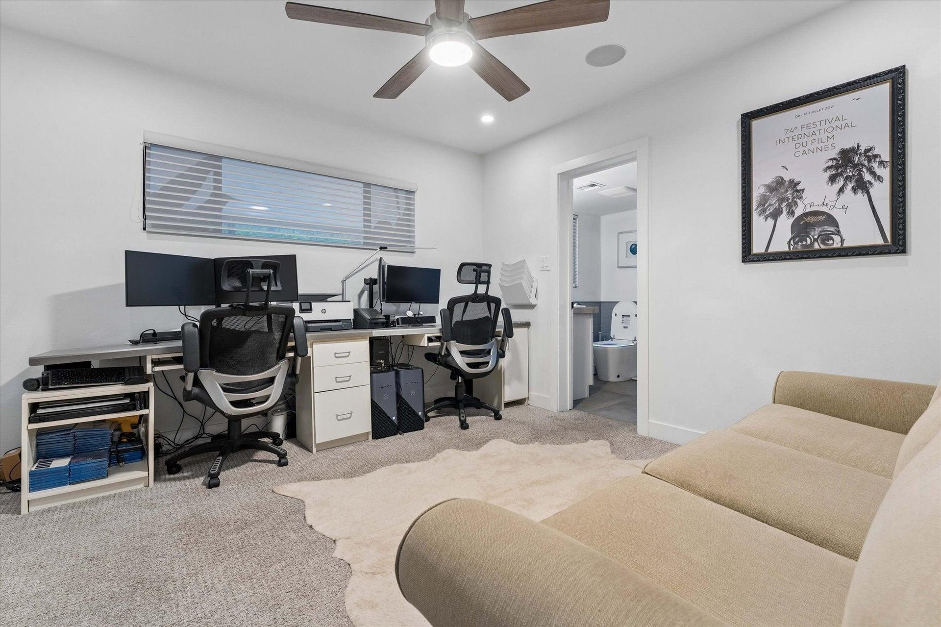 Office space with a queen pullout sofa couch for additional space and ensuite bathroom.