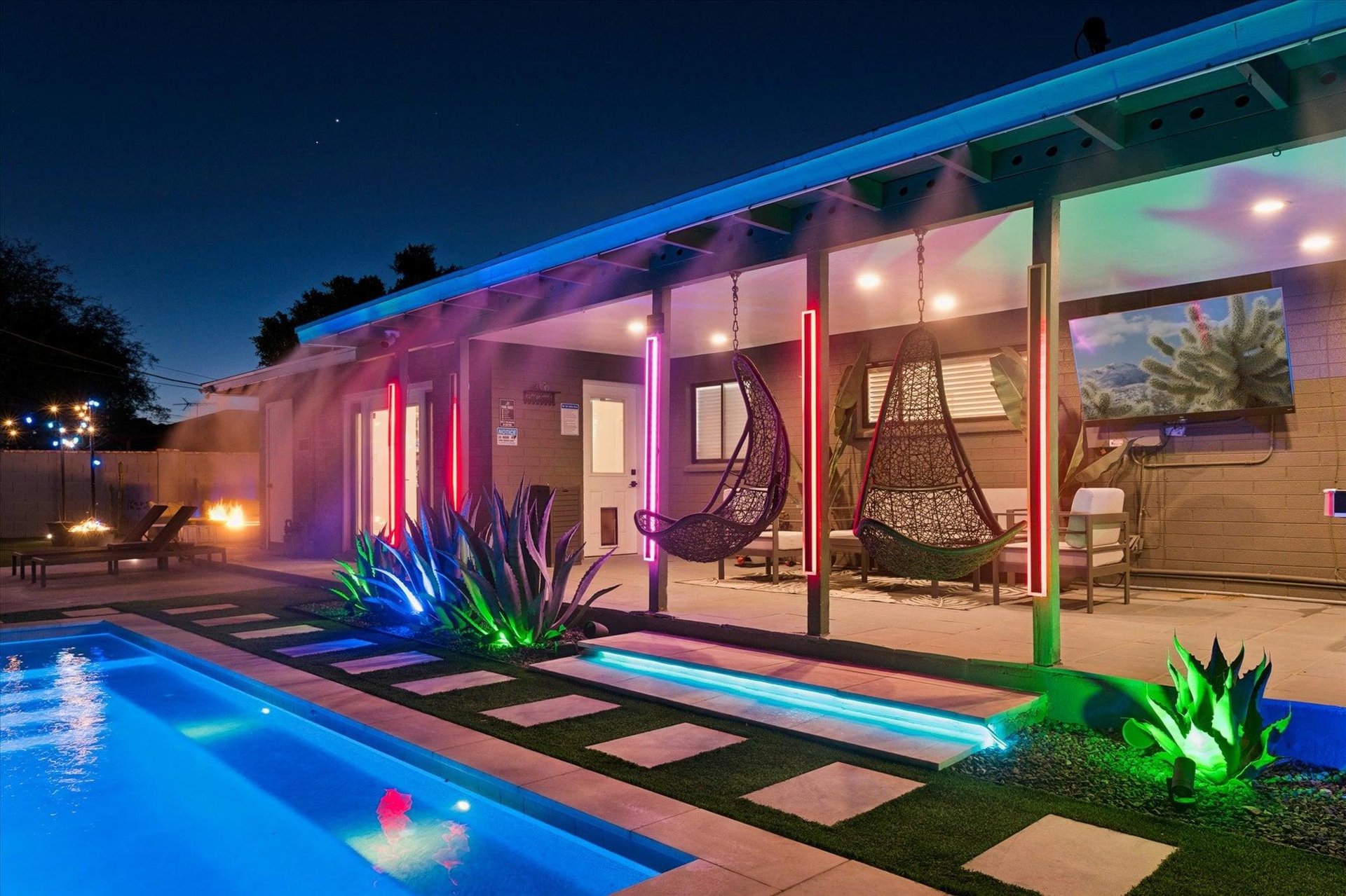 Equipped with outdoor seating, TV, pool table, swinging chairs, misters and speakers.