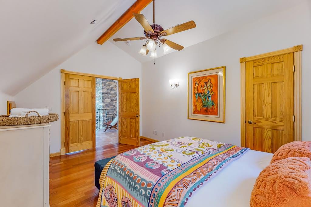 Located upstairs with 1 Queen bed.