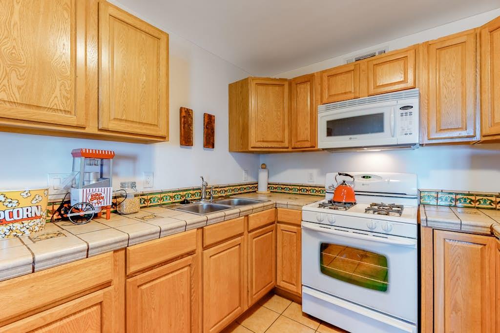 Second full kitchen downstairs makes the home perfect for spreading out families.
