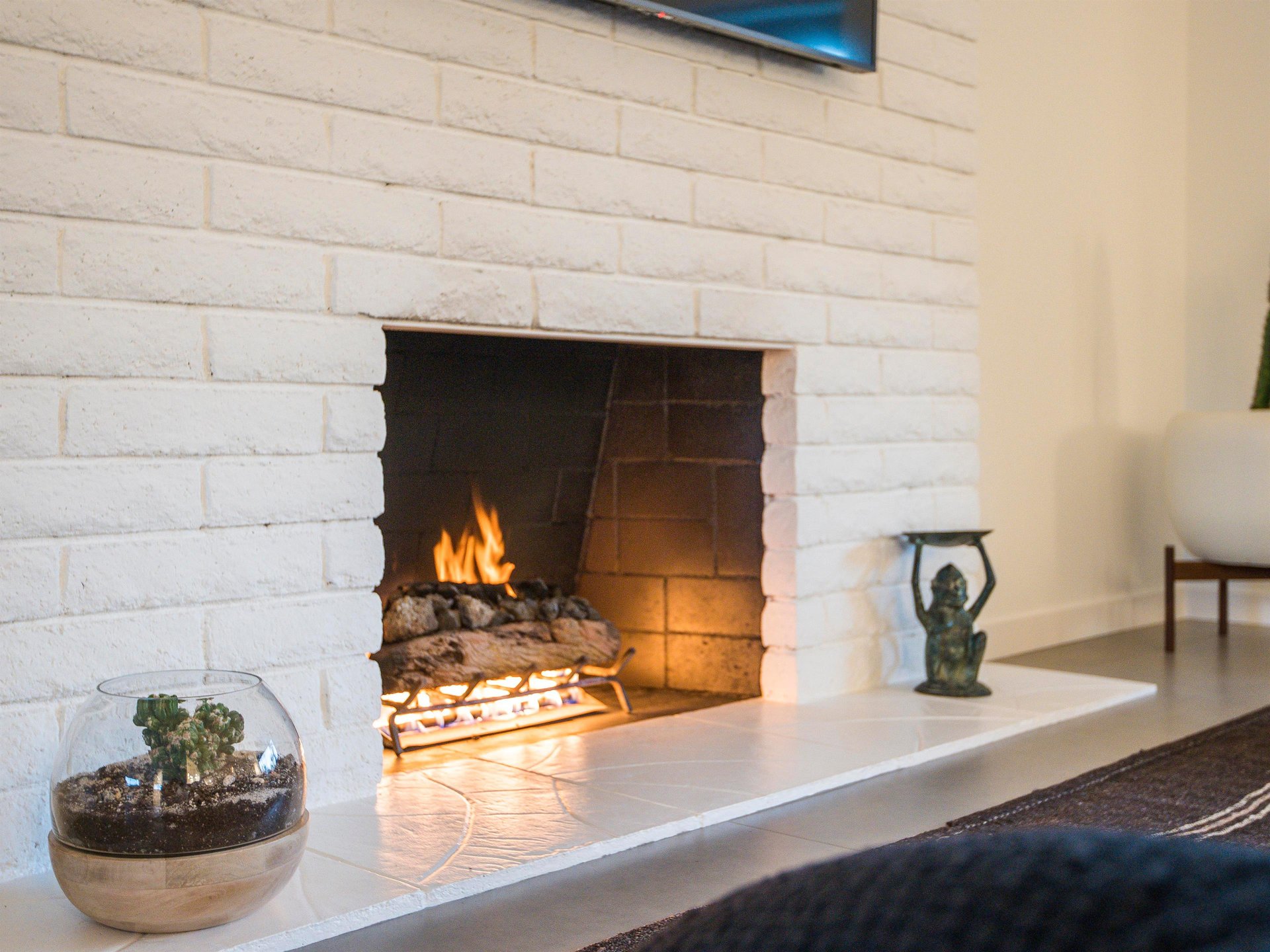 Get cozy by the fireplace