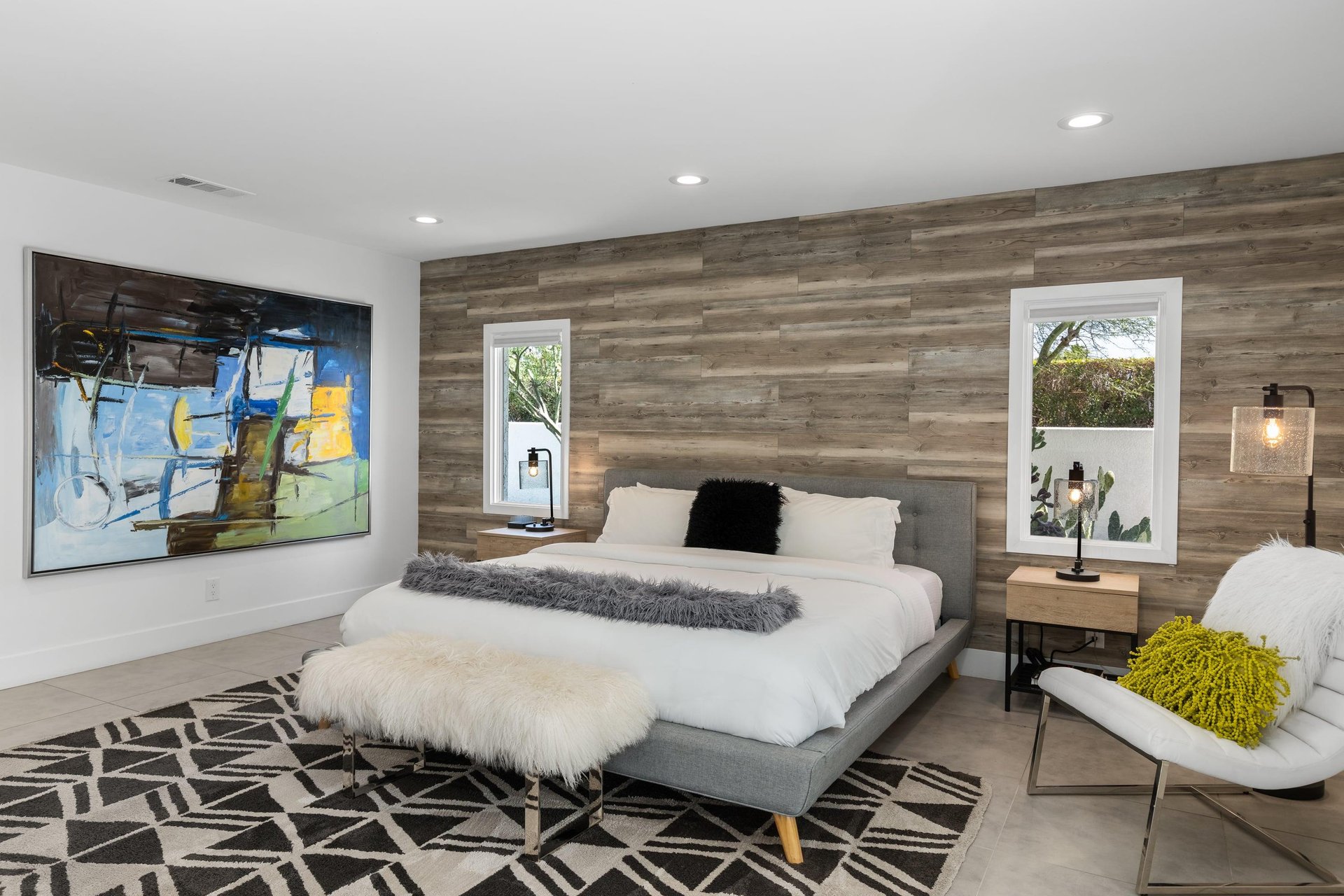 King size bed, seating area, private wet bar, bar seating, and direct patio access.