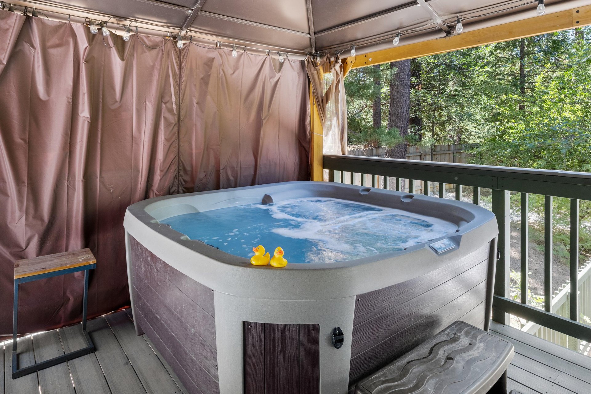 Private hot tub located on the main covered deck.