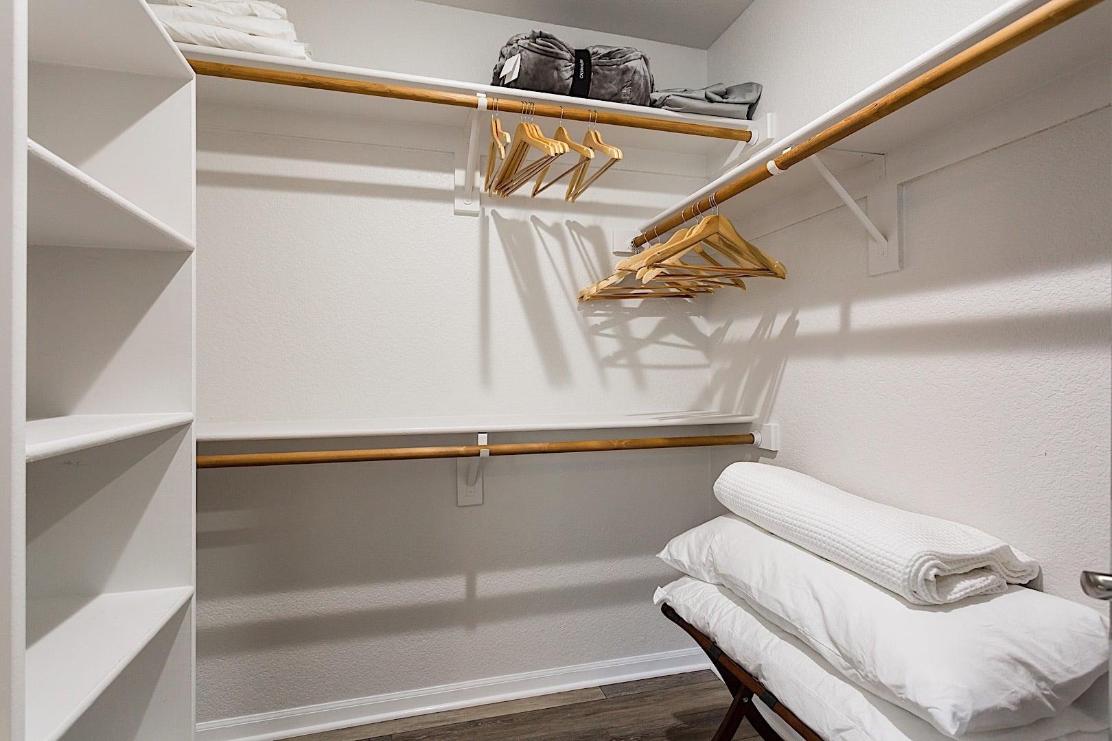 Large Walk in closet with some extra comfortable blankets and pillows available