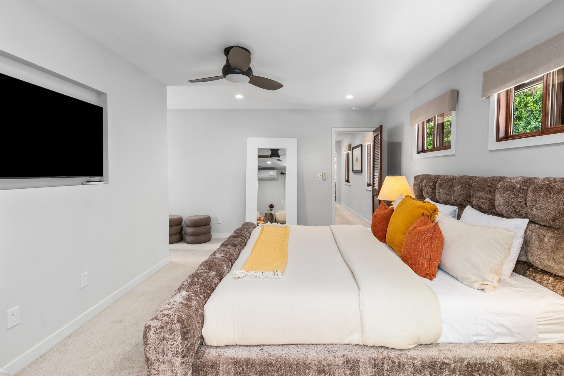 King bed, Smart TV, patio access, and ensuite bathroom.