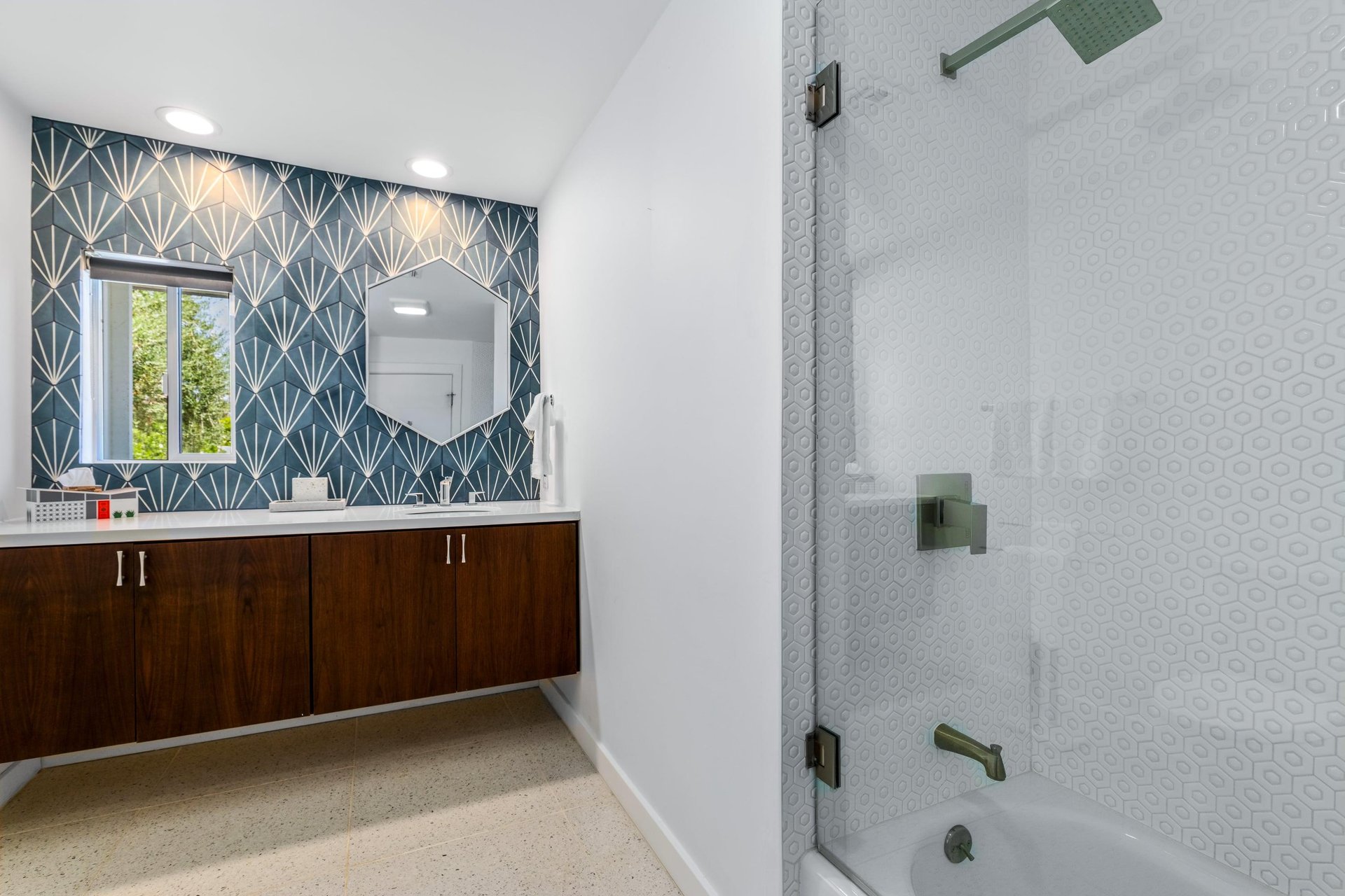 Plenty of counter space and showertub combination.