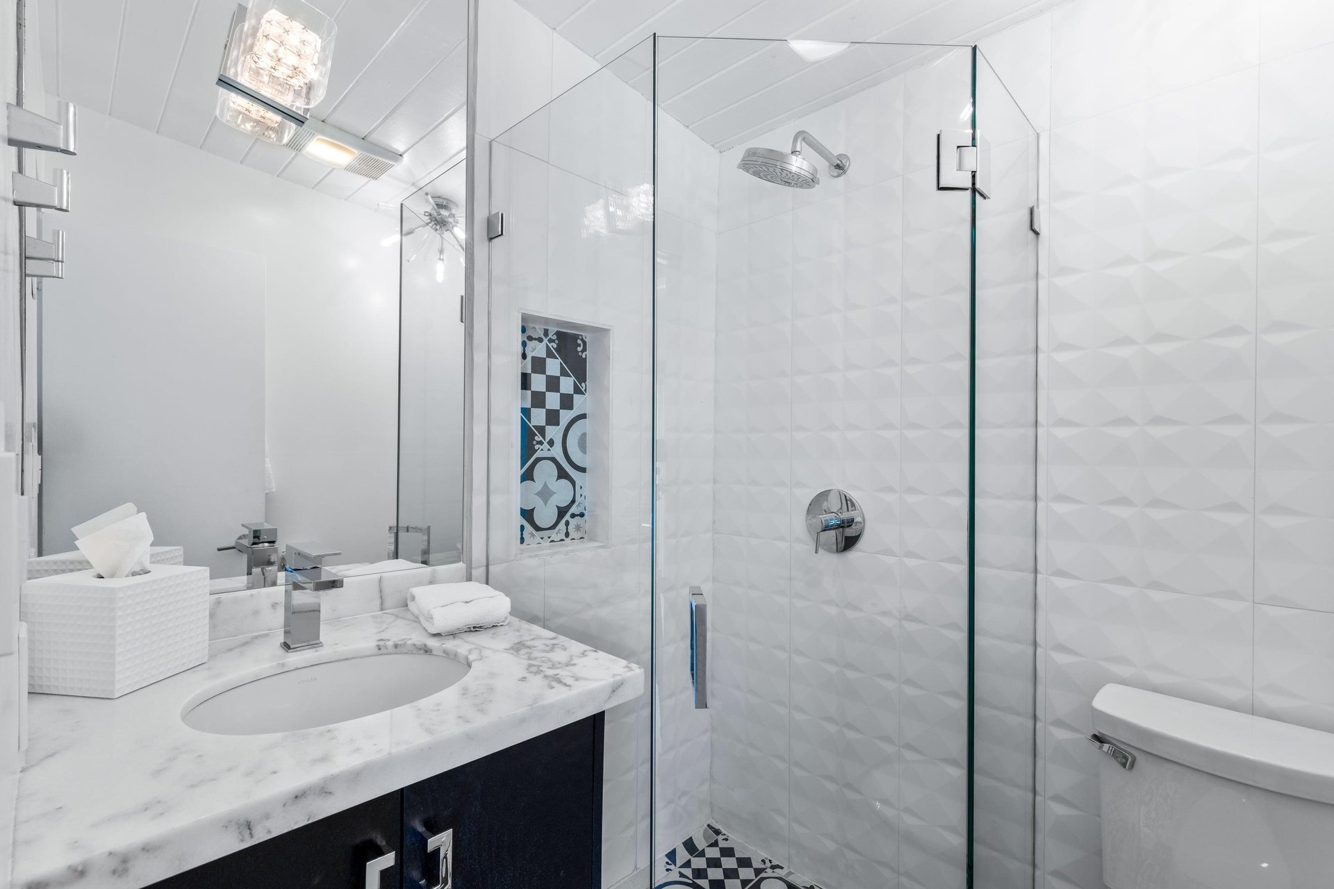 Full bathroom with walkin shower.