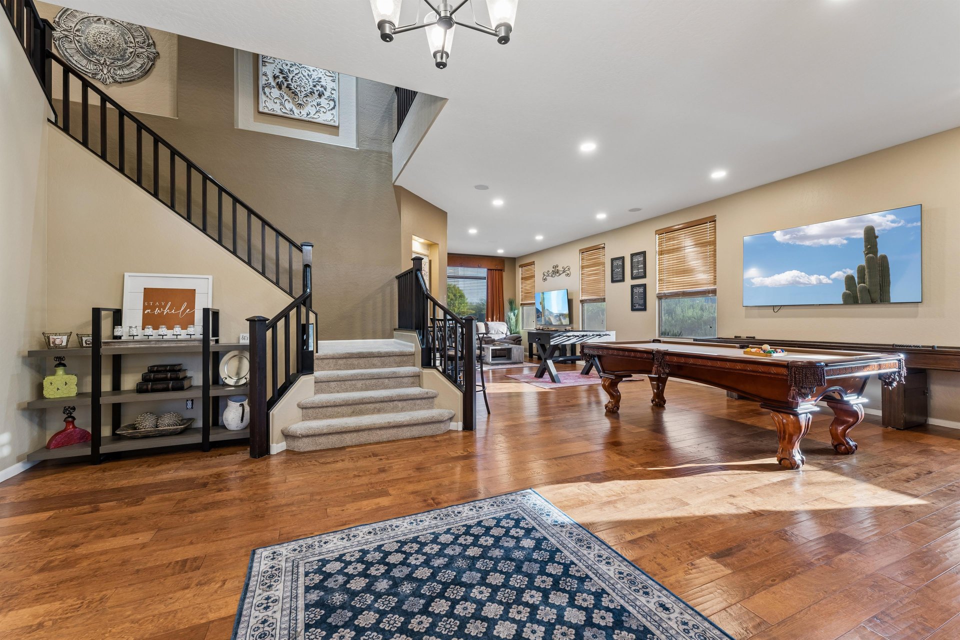 Features a pool table, foosball, and shuffleboard