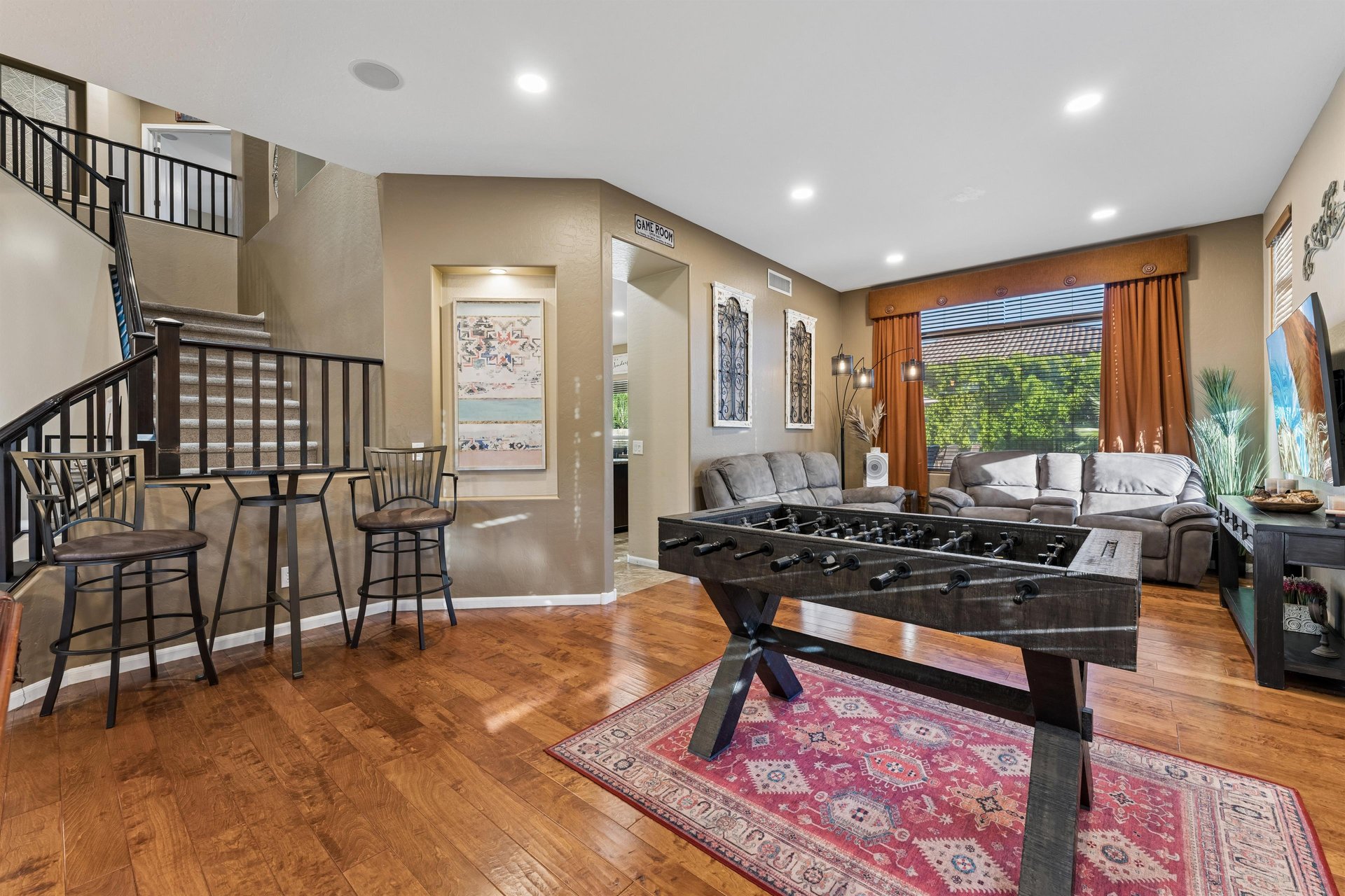 Features a pool table, foosball, and shuffleboard