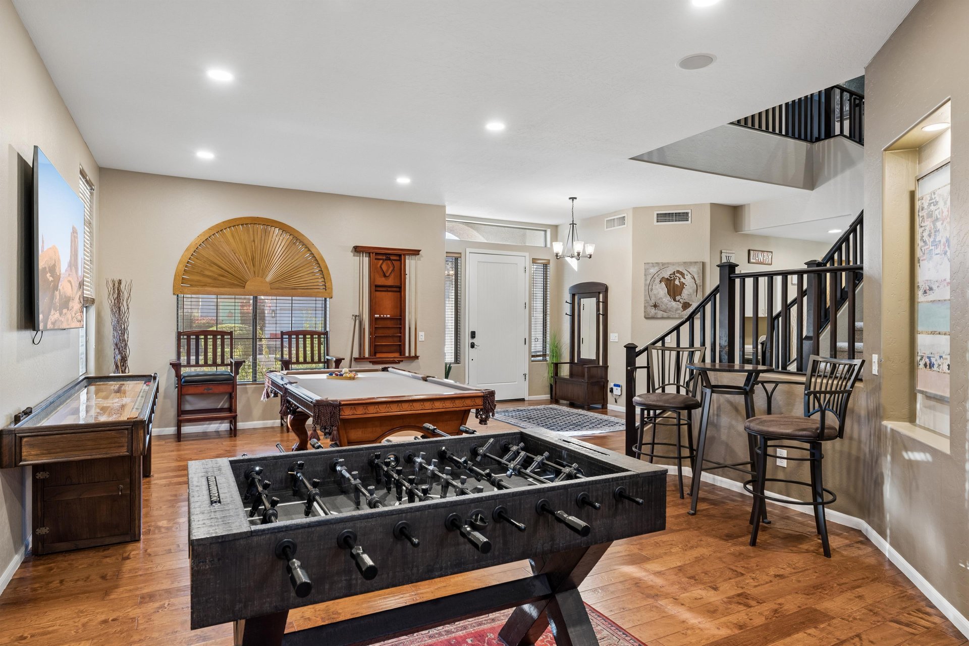 Features a pool table, foosball, and shuffleboard