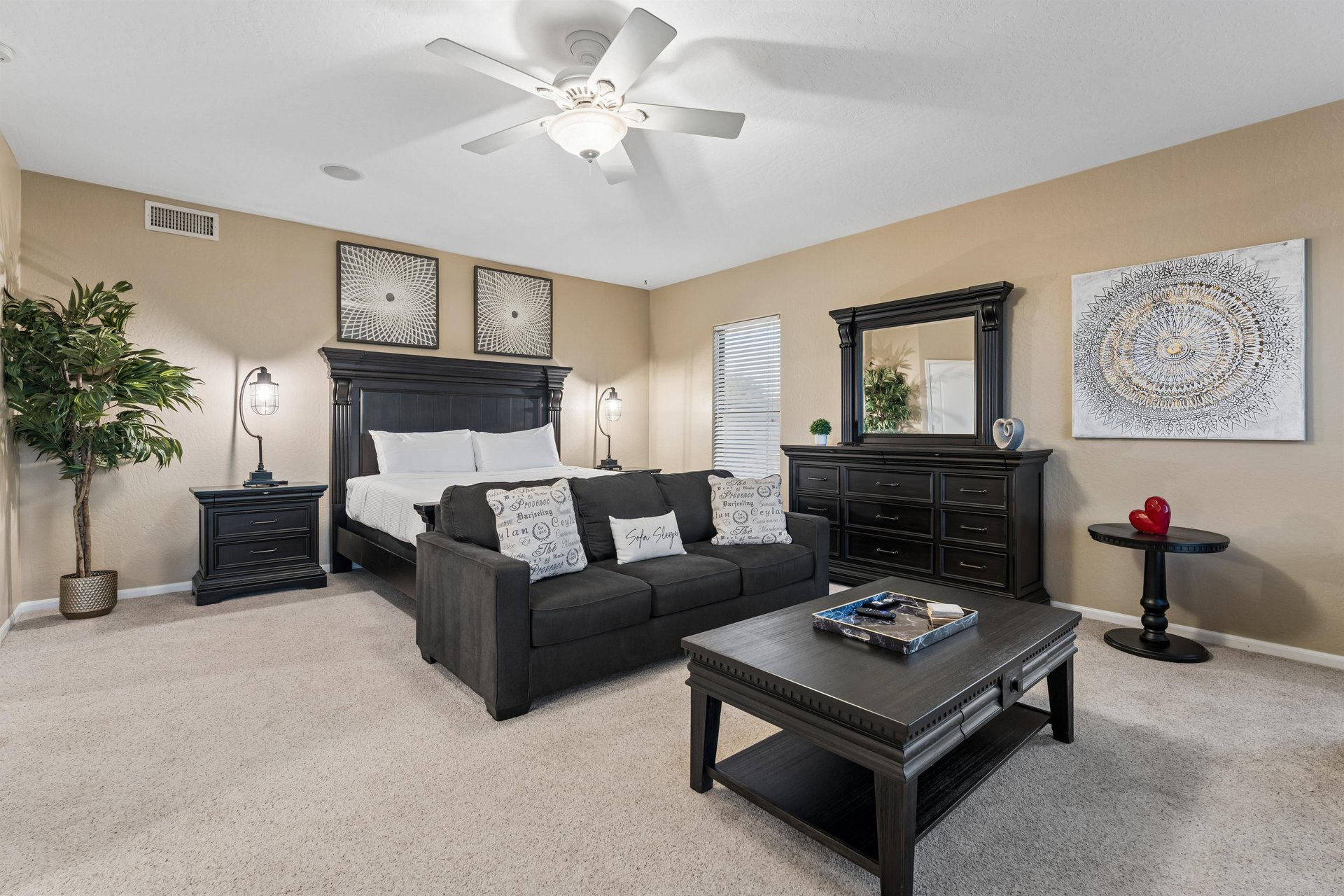 Features a king size bed, pullout sofa bed, flatscreen TV with streaming, and an ensuite bathroom.
