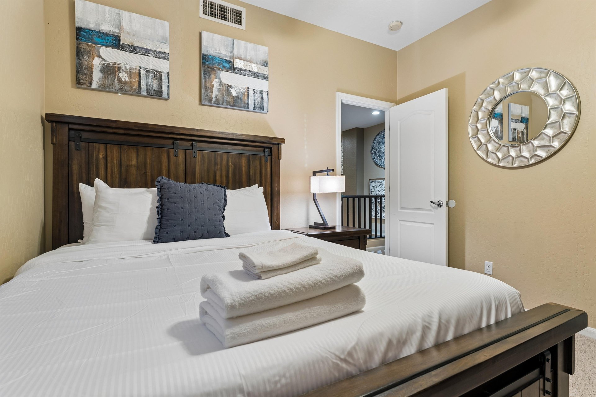 Queen size bed, closet space, and flatscreen TV.