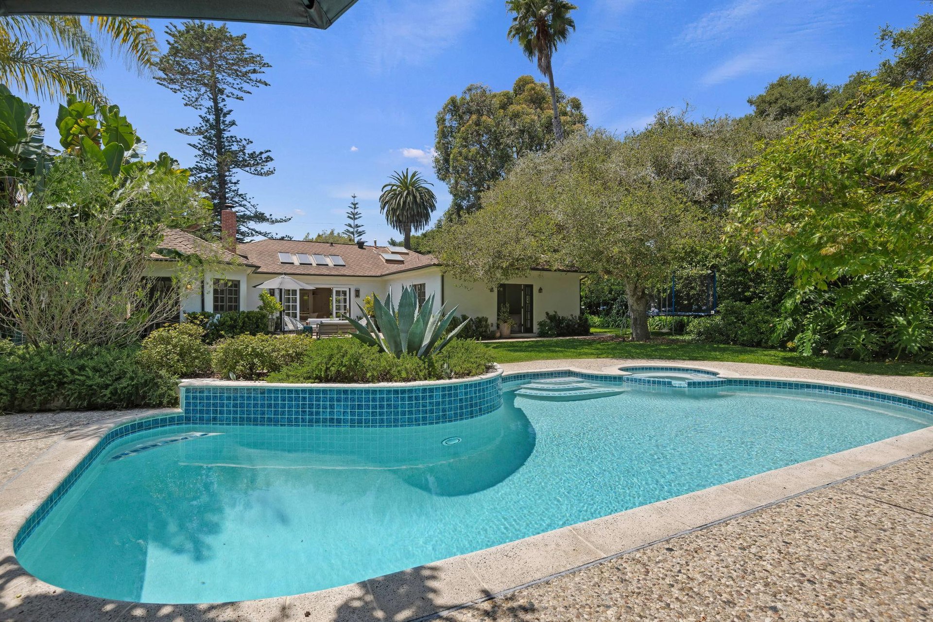 Pool, Jacuzzi, and  Main House