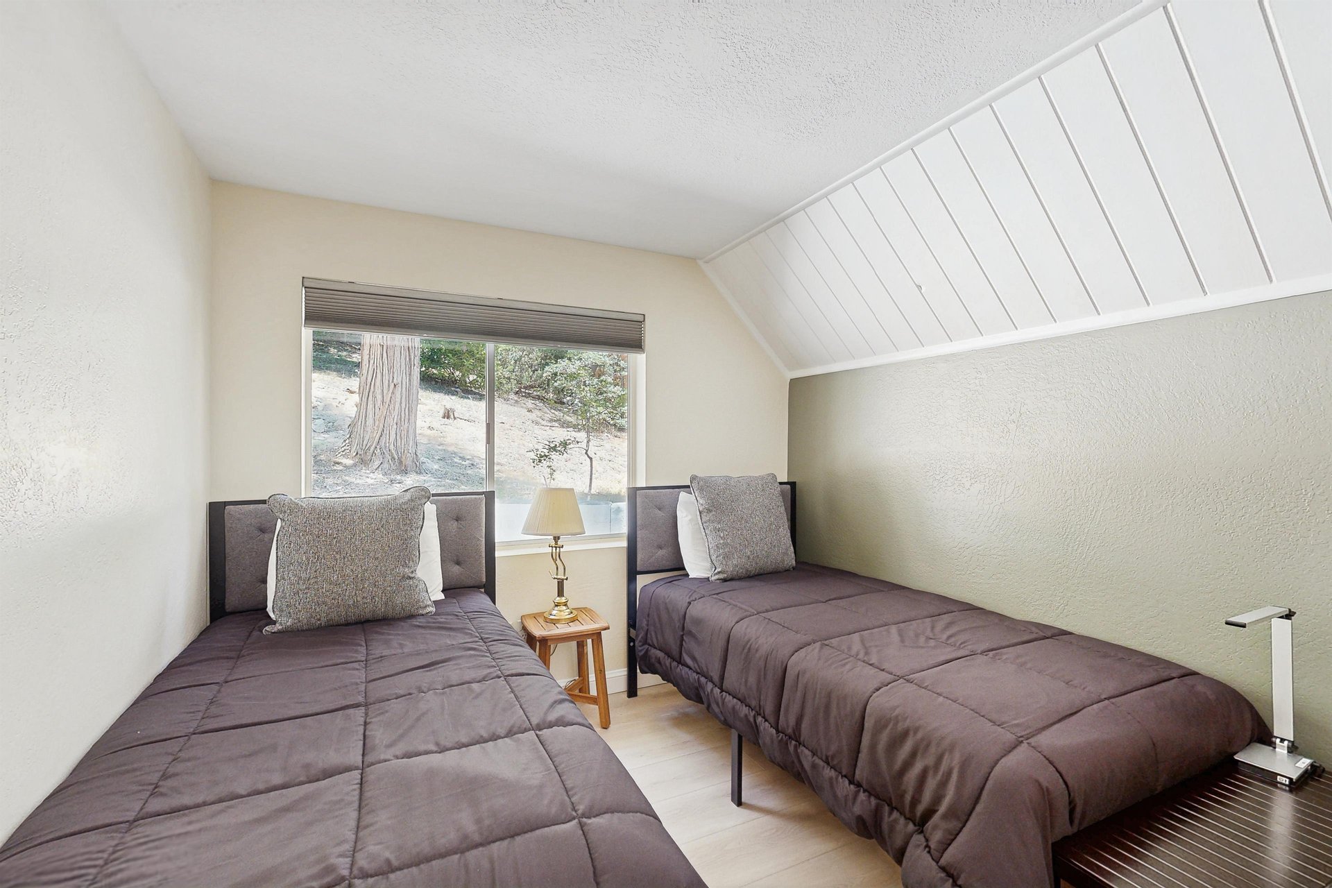 Located on the main level, two twin size beds.
