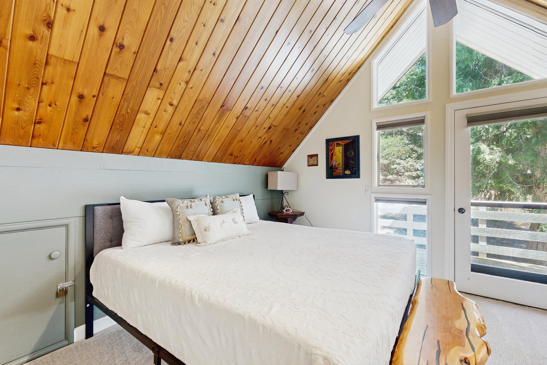 Located on the top level with a king size bed, private deck, and ensuite bathroom.