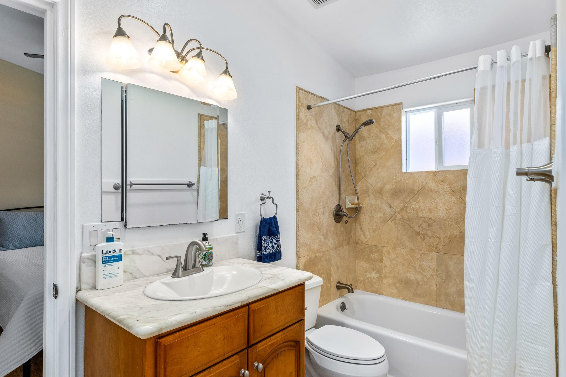 Guest bathroom with showertub combination.