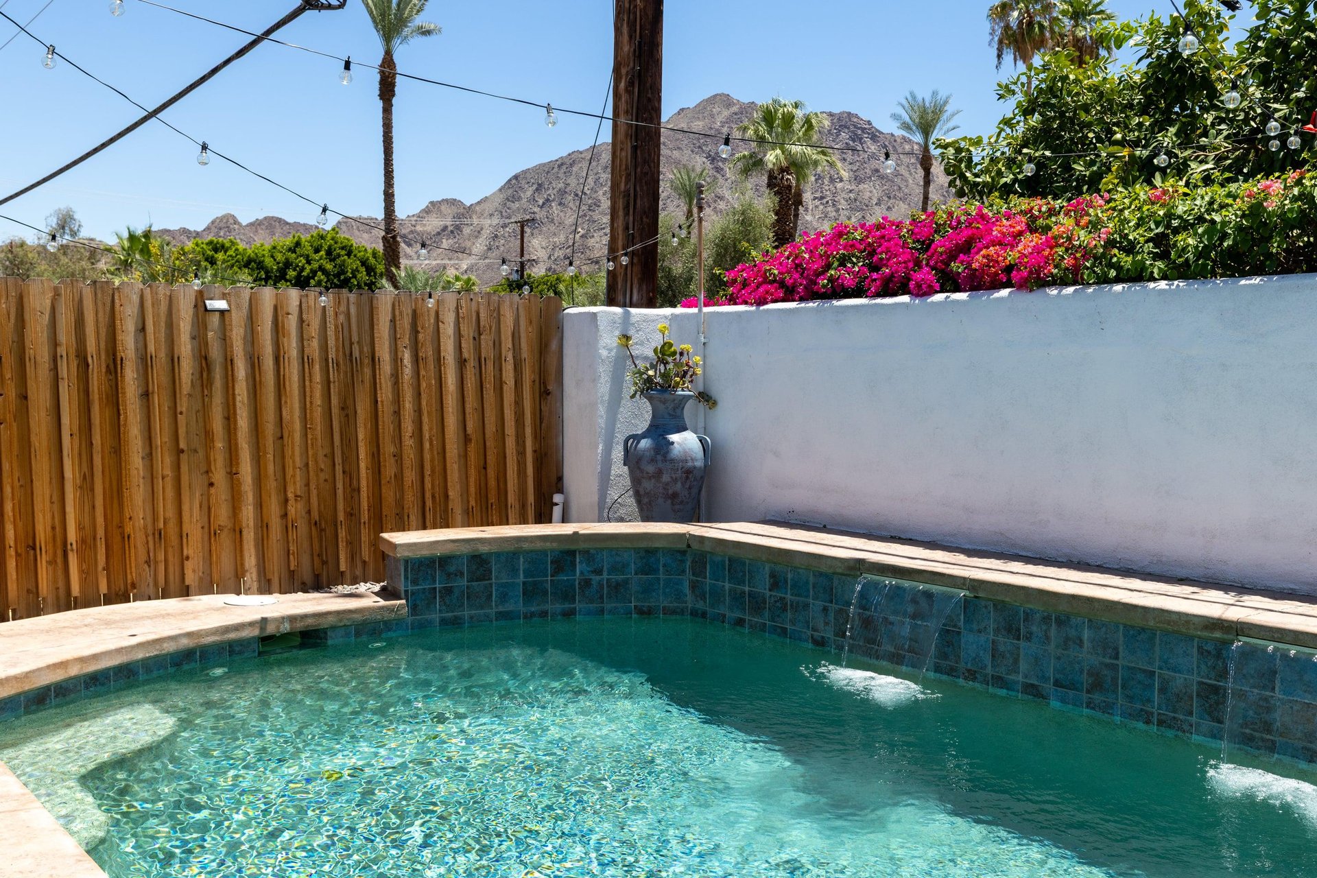 Private pool with fountains.