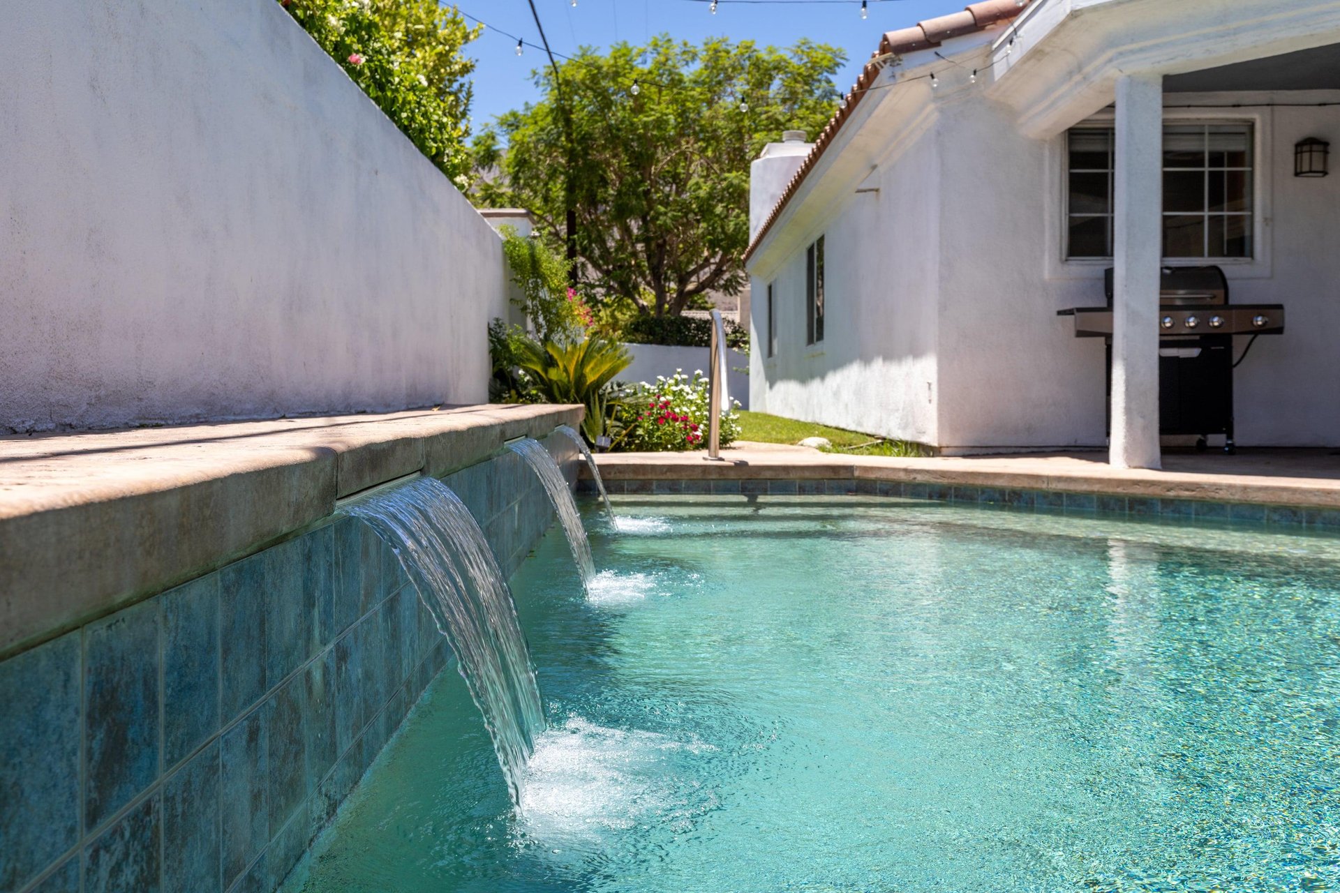 Private pool with fountains.