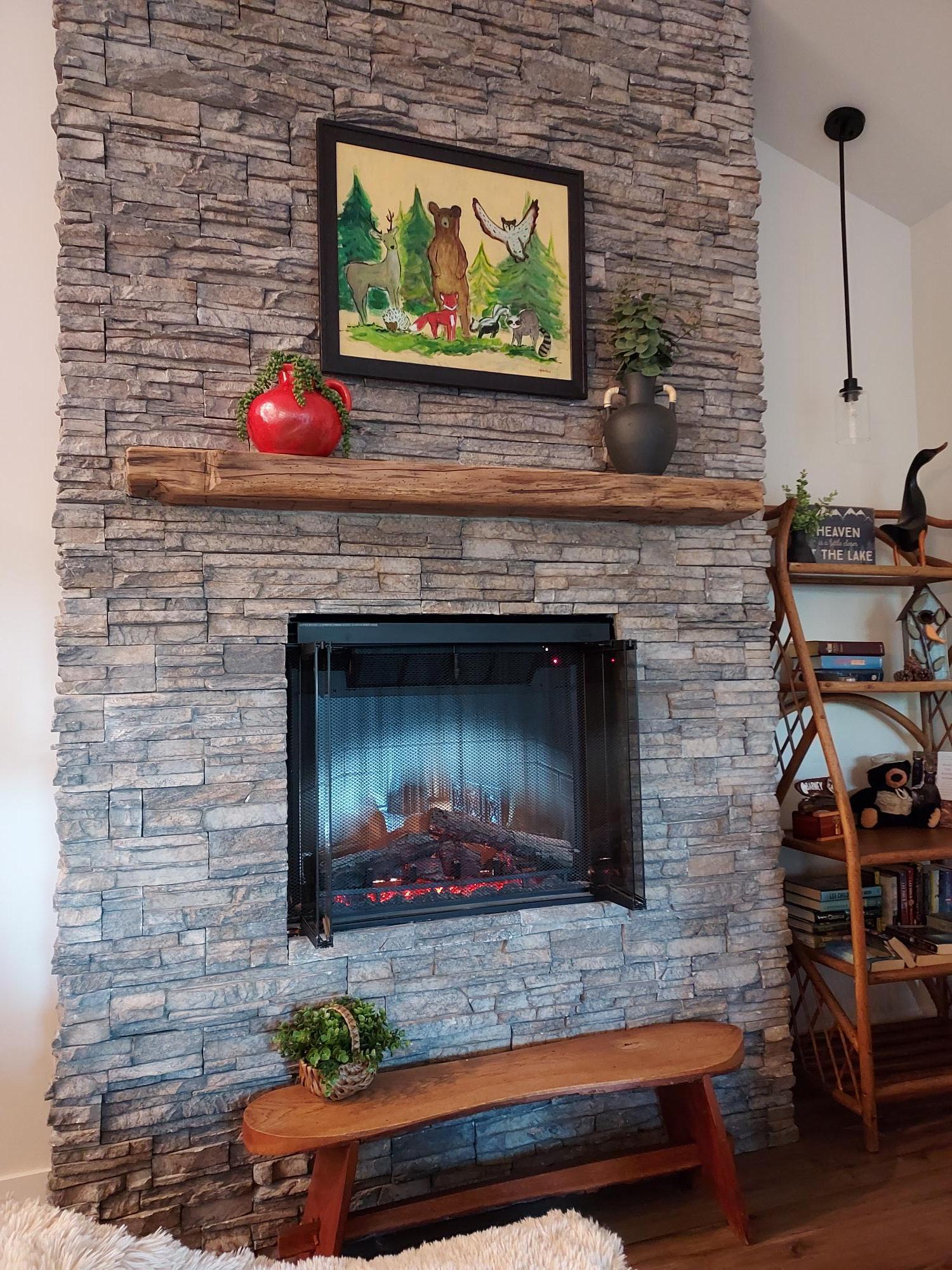 Large stone fireplace.