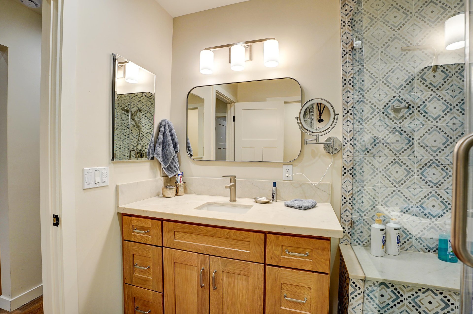 Walkin shower and modern fixtures.