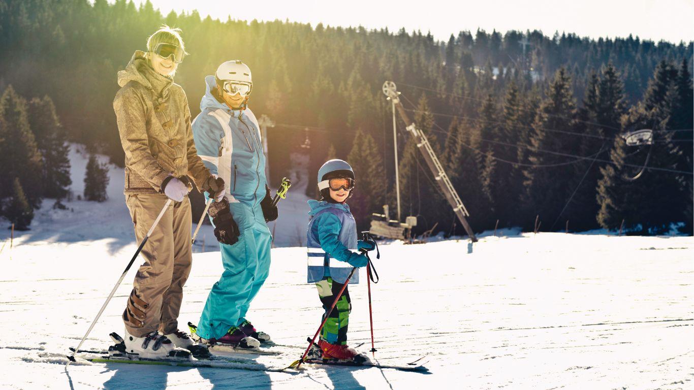 Young family skiing