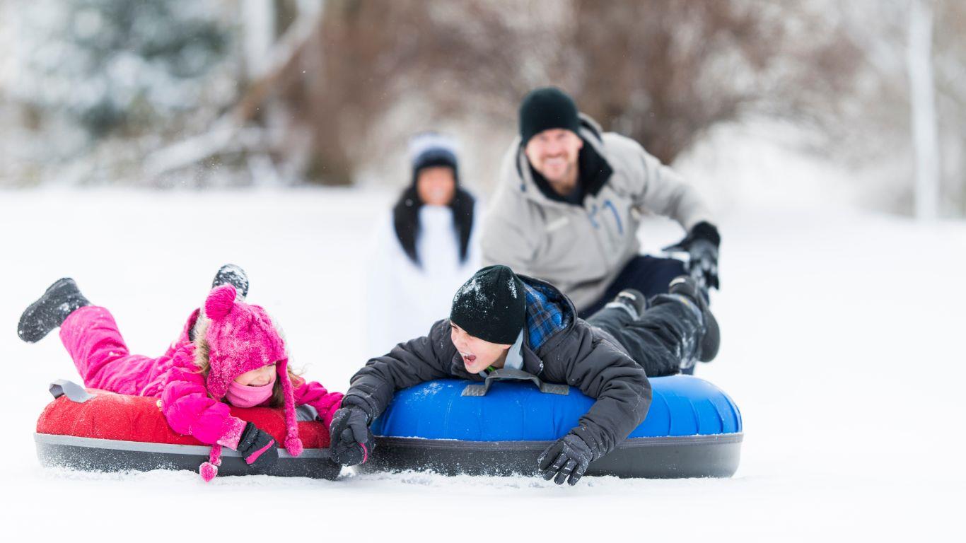 Family tubing on the snow