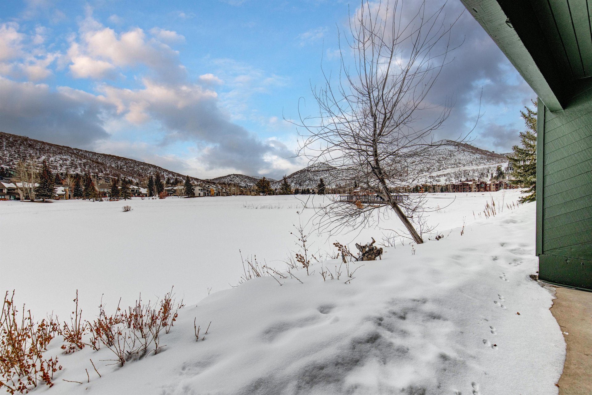 The lake covered with winter snow and mountain views.