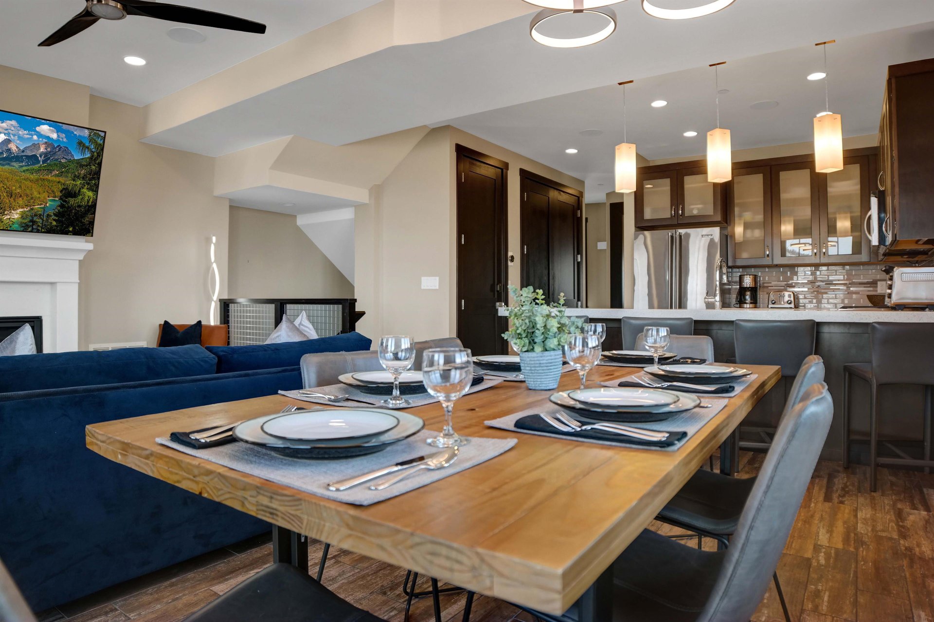 The open concept dining area with the kitchen beyond.