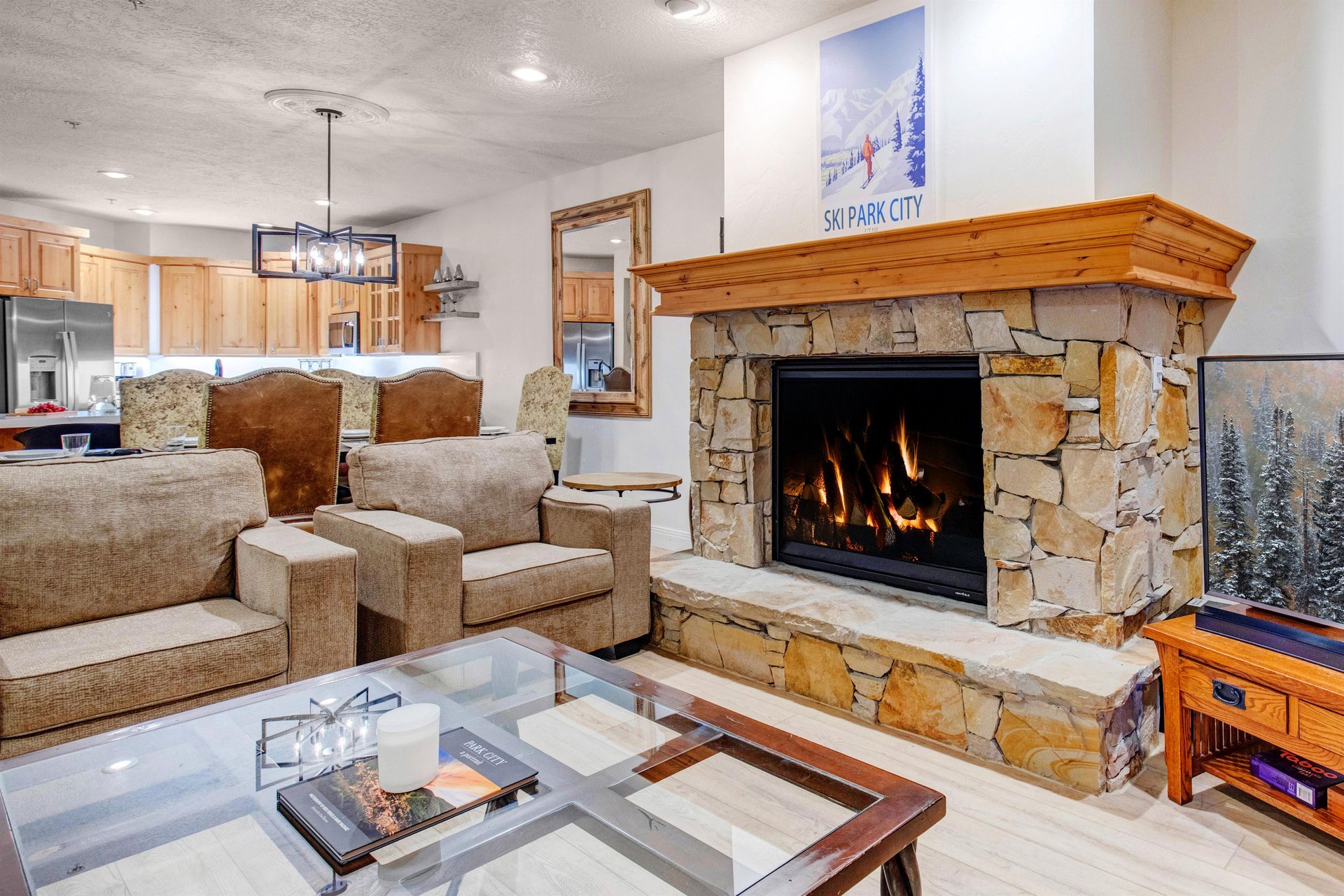 Cozy up in your mountain retreat with a crackling stone fireplace and openconcept living.