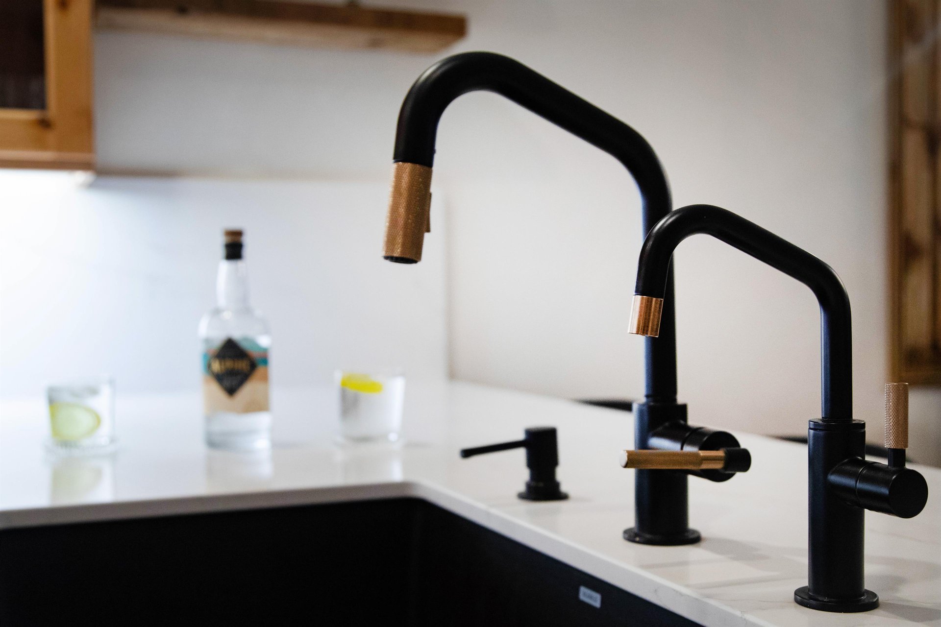 Sleek black and copper fixtures complement your modern kitchen.