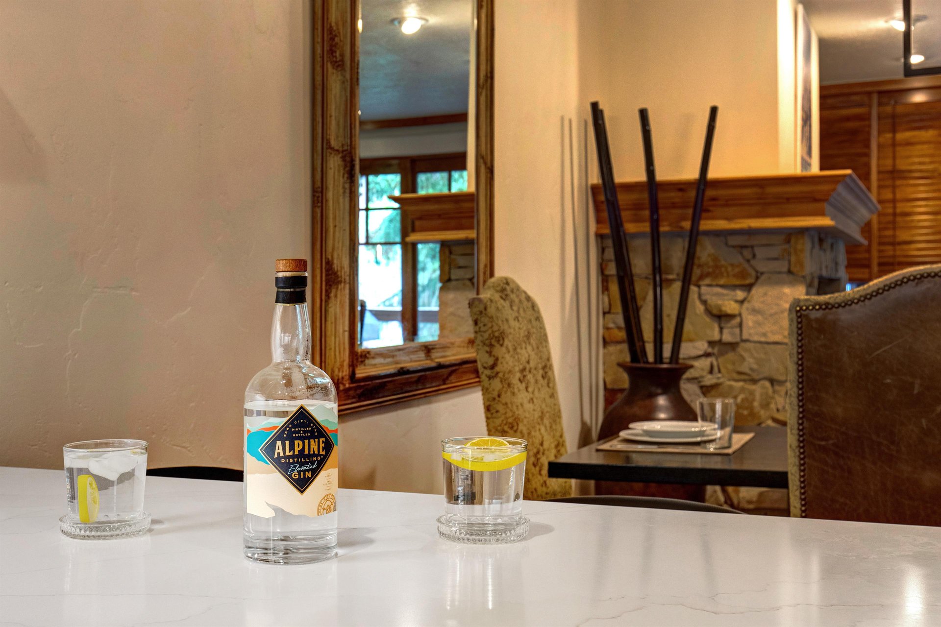Unwind with your favorite beverage at the sleek bar counter, where thoughtful décor and ambient touches create a refined space for relaxation.