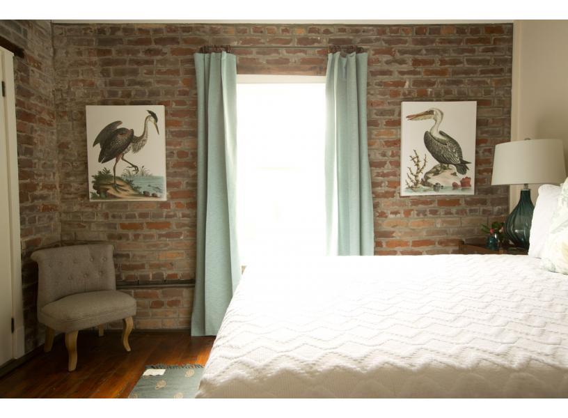 Lots of light gathers in the upstairs bedroom.