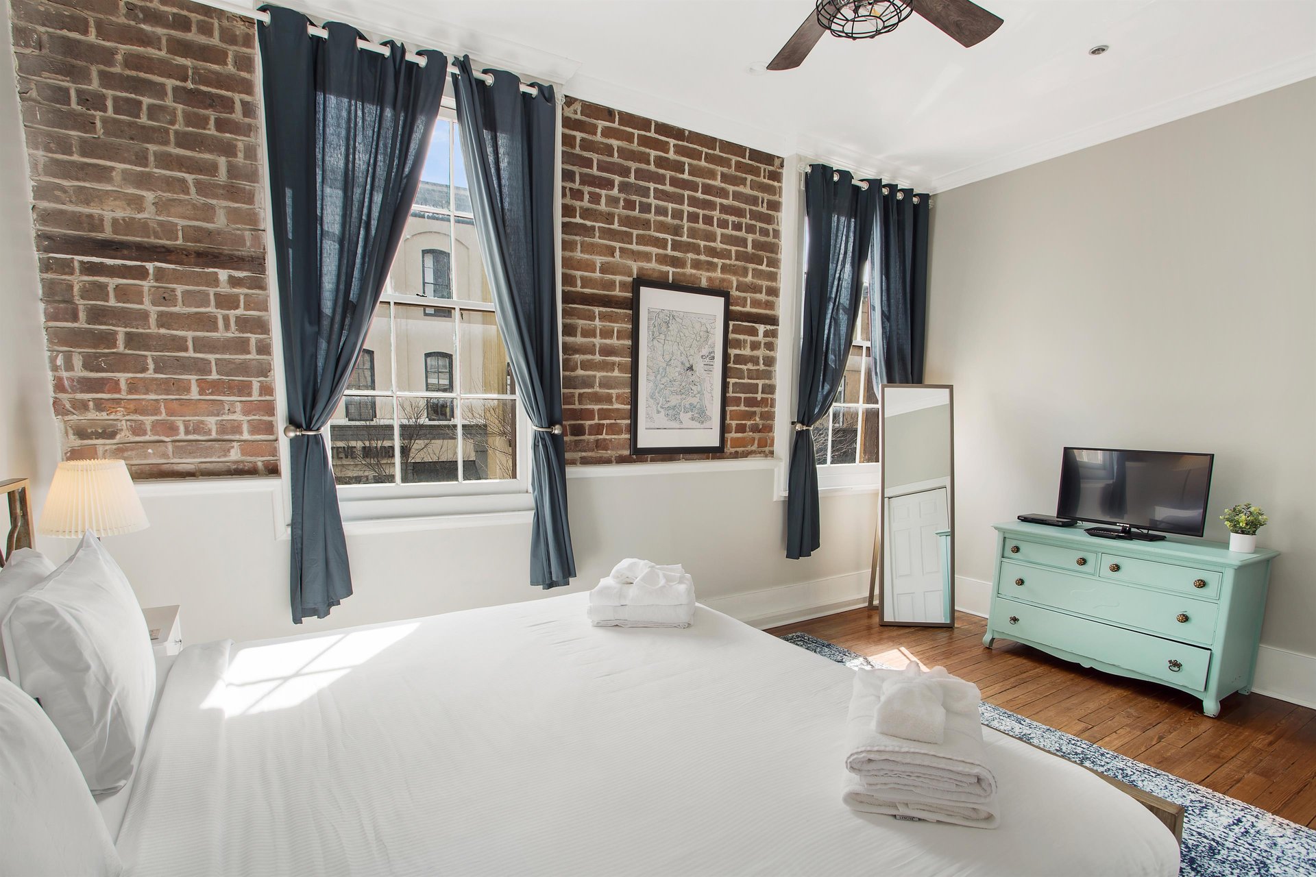 The exposed brick adds so much character to this space